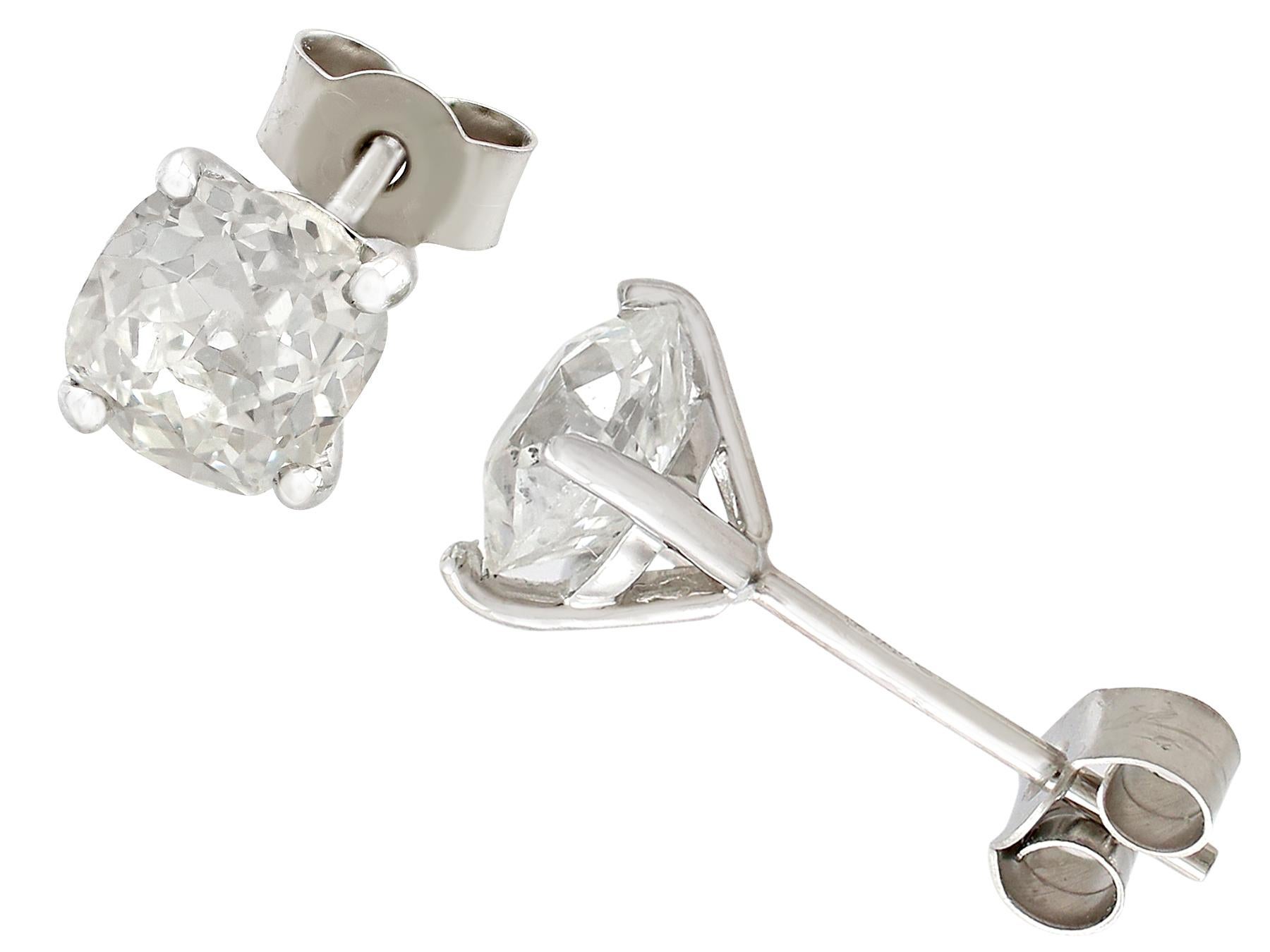 A stunning pair of antique 2.28 carat diamond earrings set to contemporary 18ct white gold settings; part of our diverse diamond jewellery and estate jewelry collections.

These stunning, fine and impressive antique diamond earrings have been