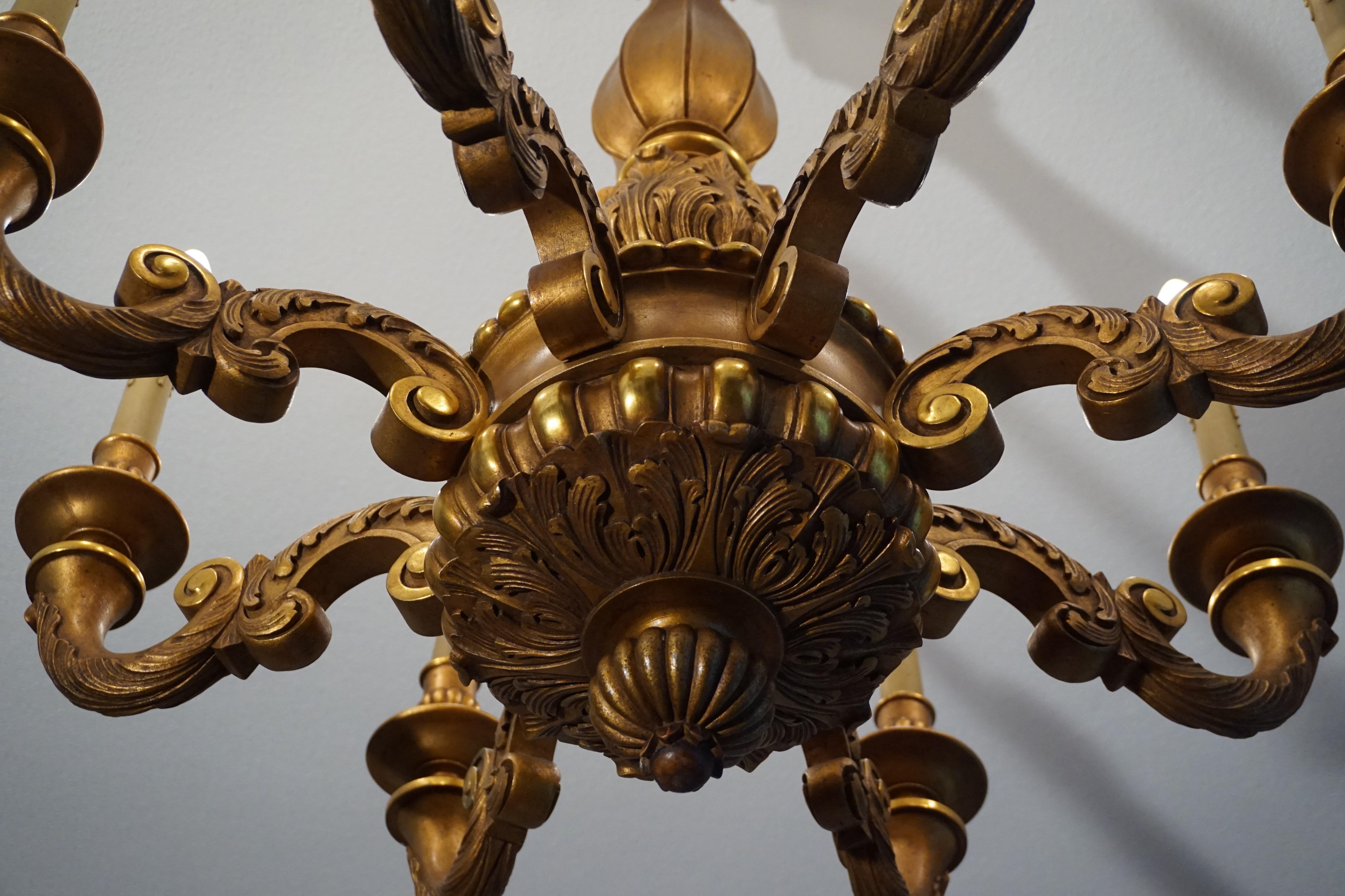 European Antique and Good Size Hand Carved and Gilt Wooden Eight-Light Pendant Chandelier For Sale
