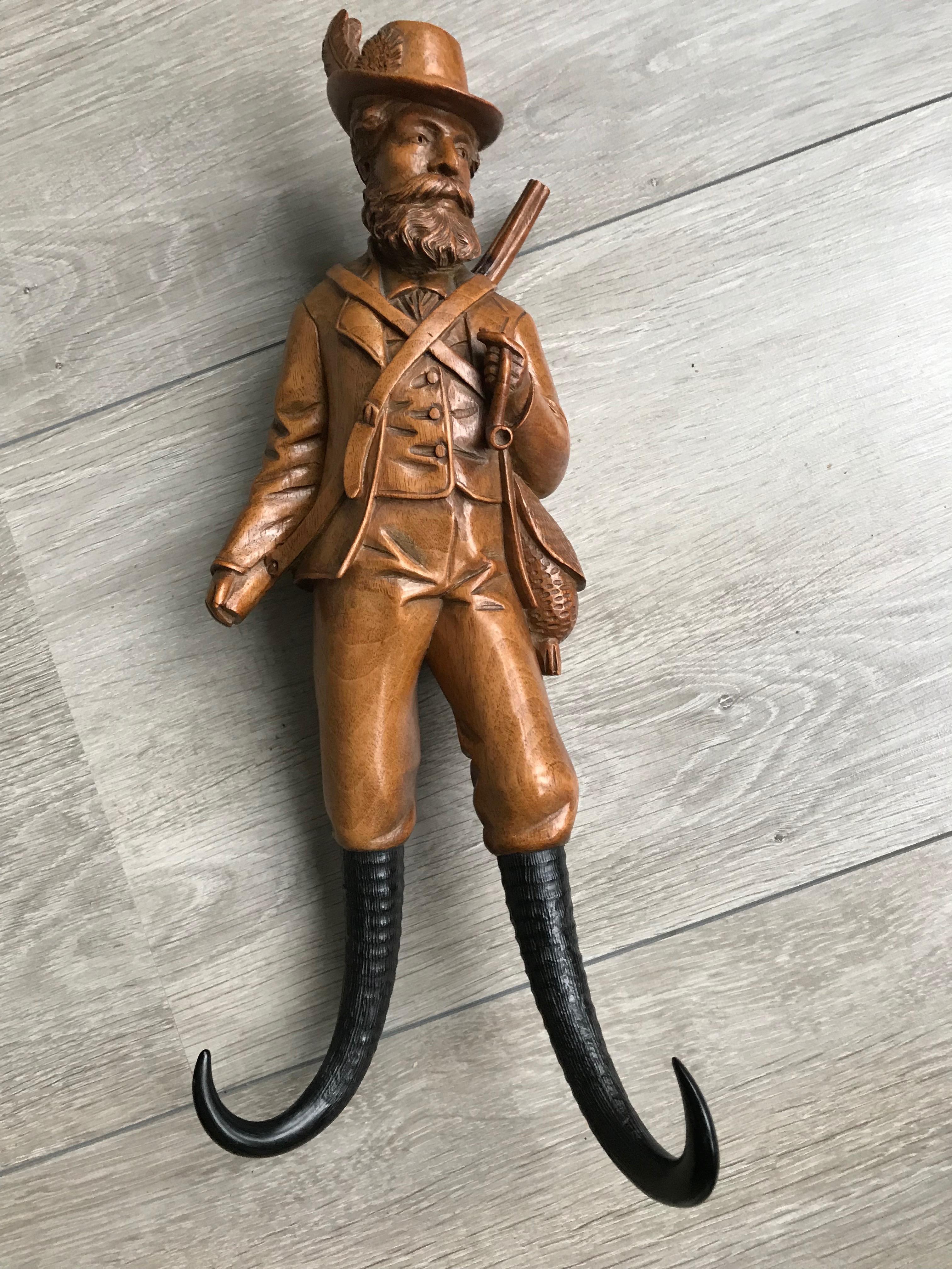 Beautifully carved Black Forest antique of museum quality and condition.

This hand-carved antique whip hook in the shape of a hunter is in excellent condition. If you are a collector of only the best quality and best condition specimen than this