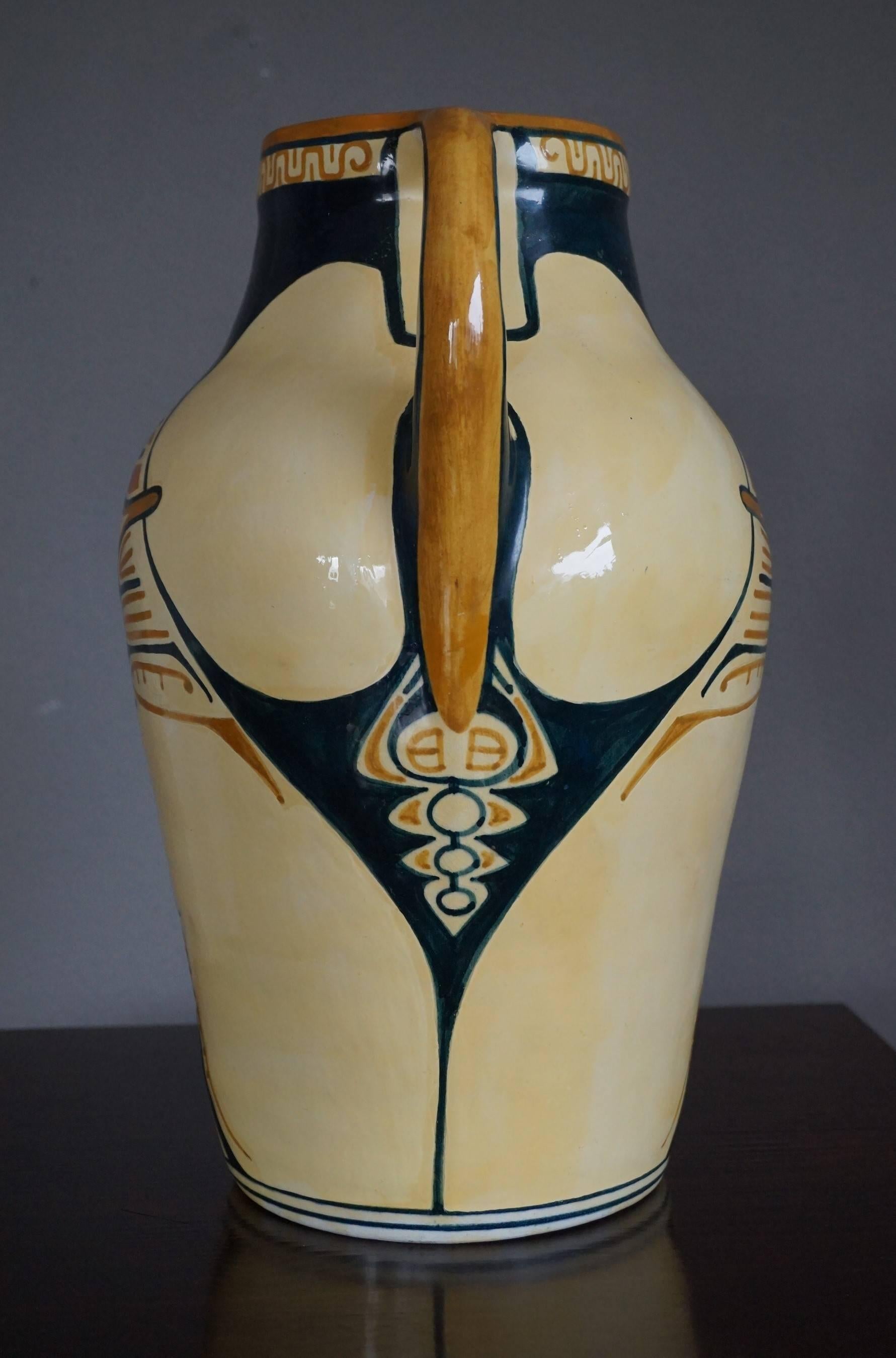 Beautiful Arts & Crafts eyecatcher.

This one of a kind, hand-crafted vase from the 'Dordtsche Kunst Pottery' is a wonderful sight to see. Vases from DKP are very rare, because the studio only existed from 1903-1908 and in the two World Wars that