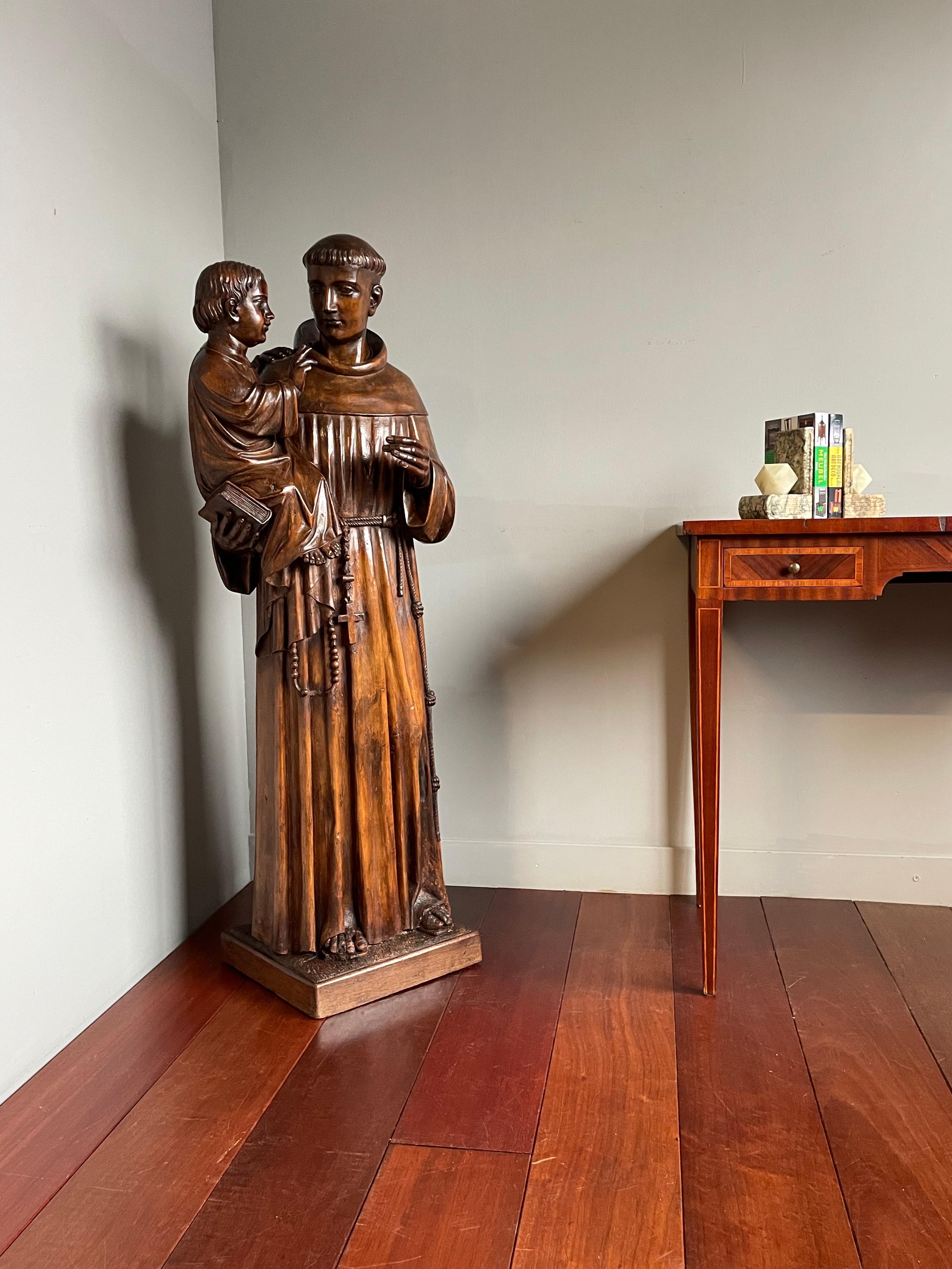 4 feet tall, finest quality carved, antique, former Catholic church or Franciscan monastery sculpture.

This rare church or monastery statue of Saint Anthony of Padua holding the Child Jesus is in very good condition. This work of religious art is