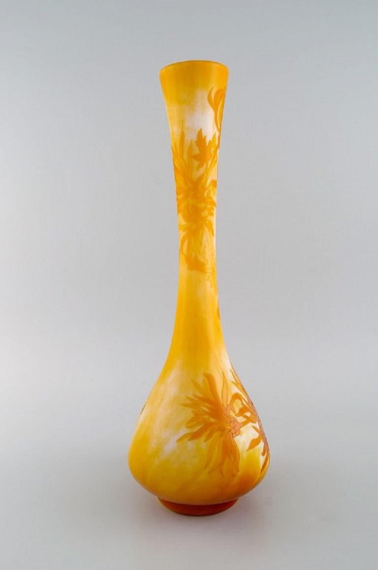 Antique and rare Emile Gallé vase in white and yellow / orange art glass carved in the form of flowers and foliage. 
Late 19th century. 
Japanism. Museum's quality.
Measures: 40 x 16 cm.
In excellent condition.
Signed.