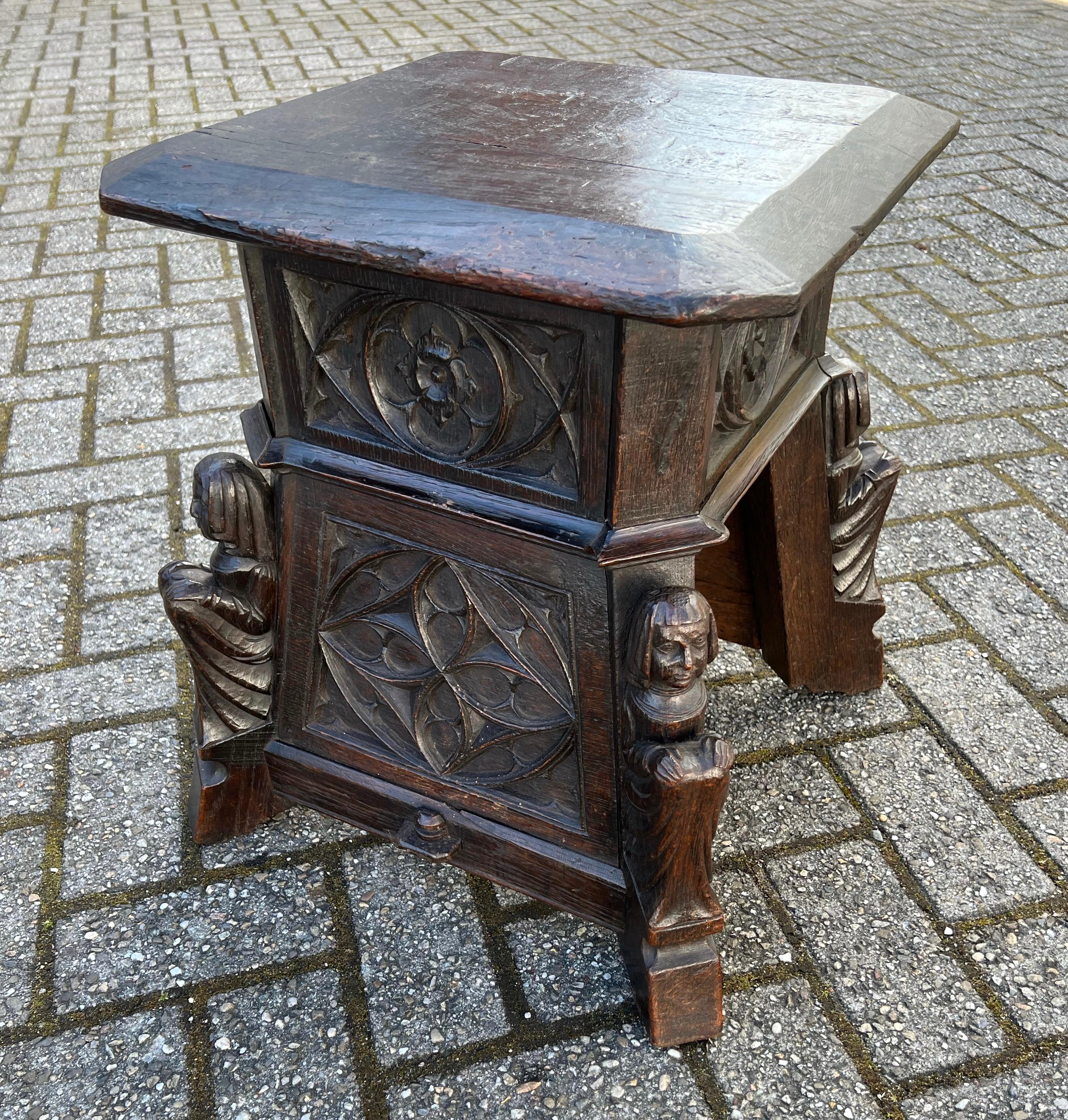 Truly medieval looking, antique sculptural stool or table in the Gothic Style.

Thanks to its honest wear of having been used for well over a century, this Gothic Revival stool very much looks like a 17th or 18th century specimen. This stained oak