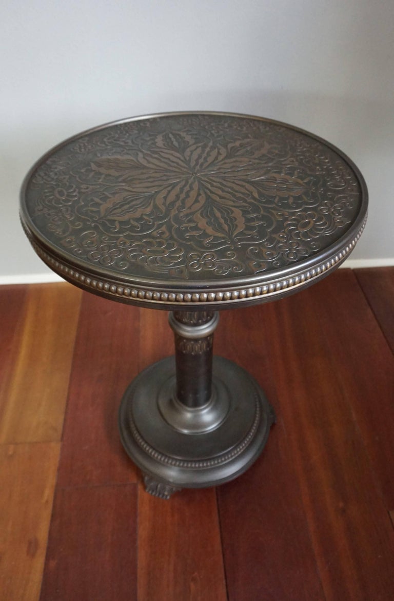 Antique and Unique Arts and Crafts Embossed Brass Table with Stylized Owl Feet For Sale at 1stdibs