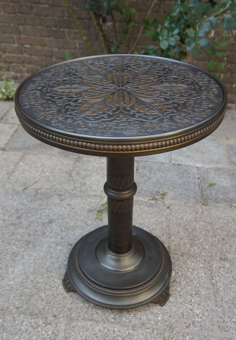 Antique and Unique Arts and Crafts Embossed Brass Table with Stylized Owl Feet For Sale at 1stdibs