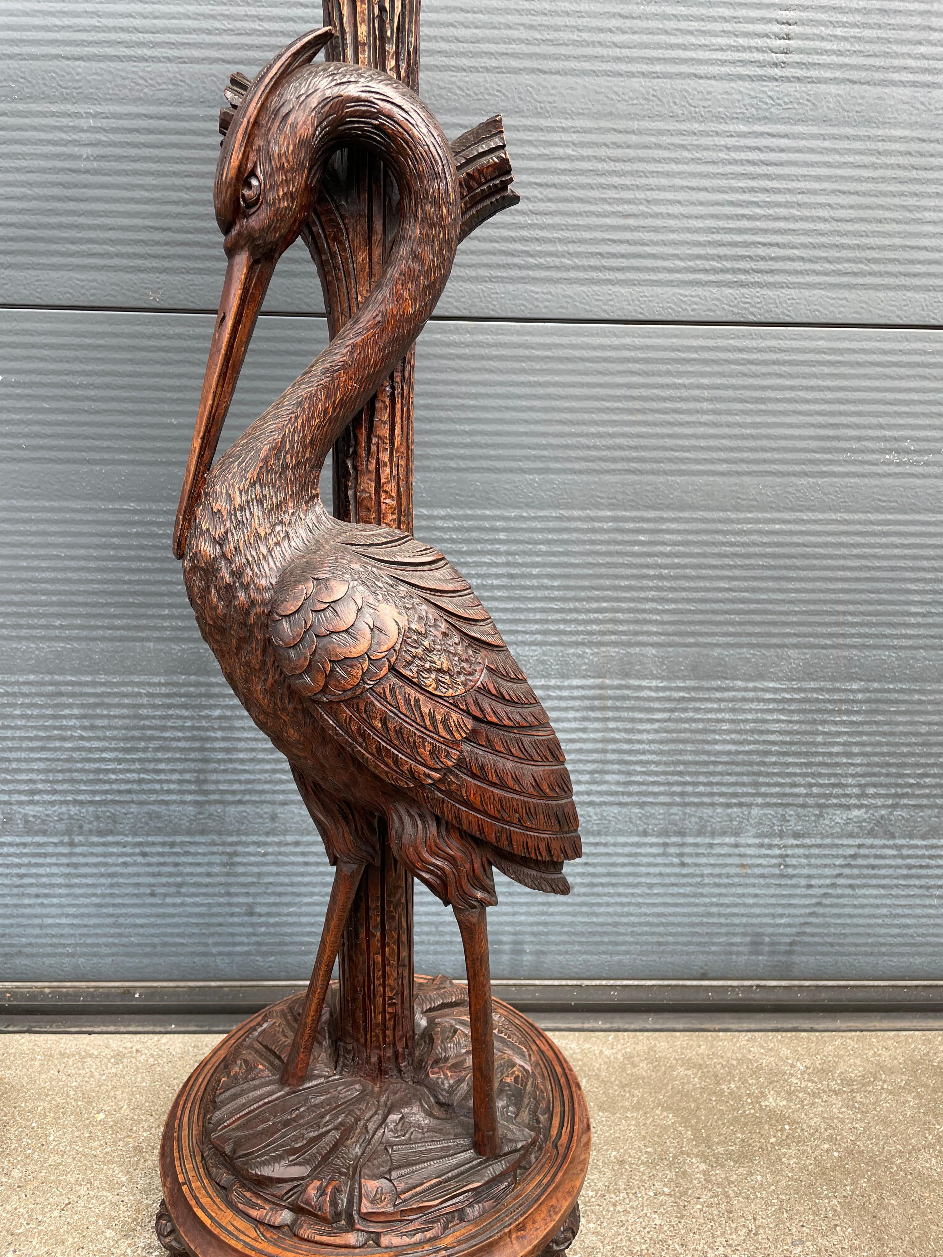 European Antique and Unique Hand Carved Pair of Black Forest Heron Sculpture Pedestals