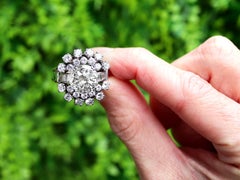 Antique and Vintage 5.74 Carat Diamond and Platinum Cluster Ring