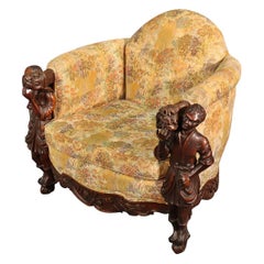 Ancienne chaise club Andrea Brustolon en noyer sculpté et figuré