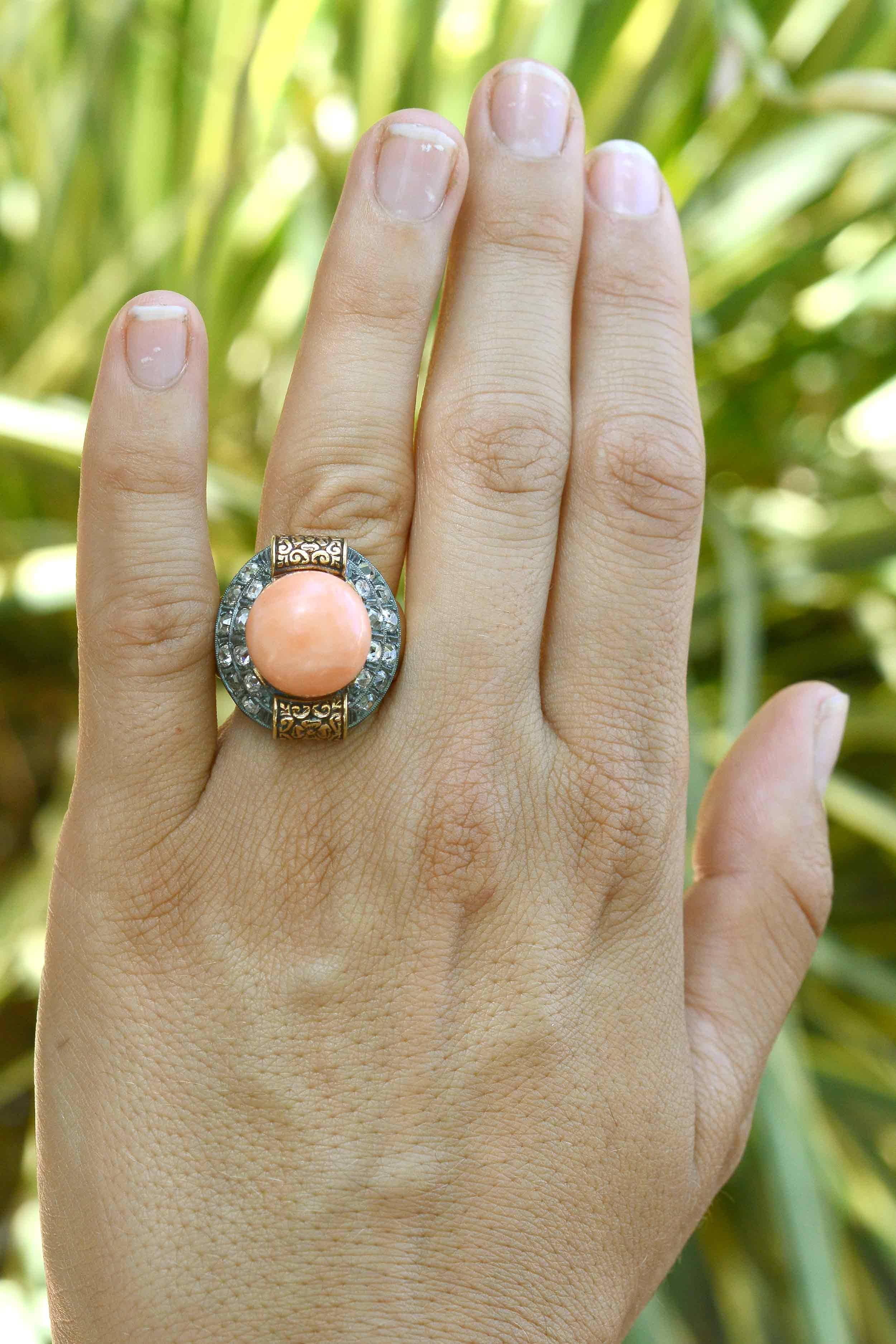 The Rosalita antique coral cocktail ring. Displaying an 