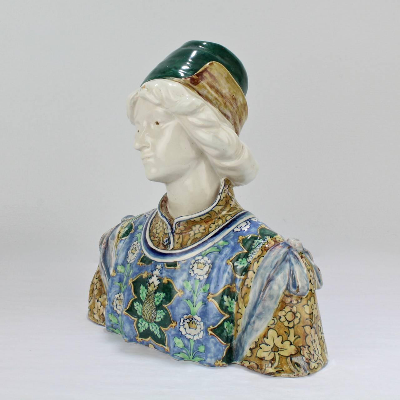 A very fine, antique Italian Maiolica bust of a Renaissance youth.

Made in the Angelo Minghetti factory in Bologna, Italy in the late 19th or early 20th century.

Angelo Minghetti started producing ceramics at Imola in 1848. He started his