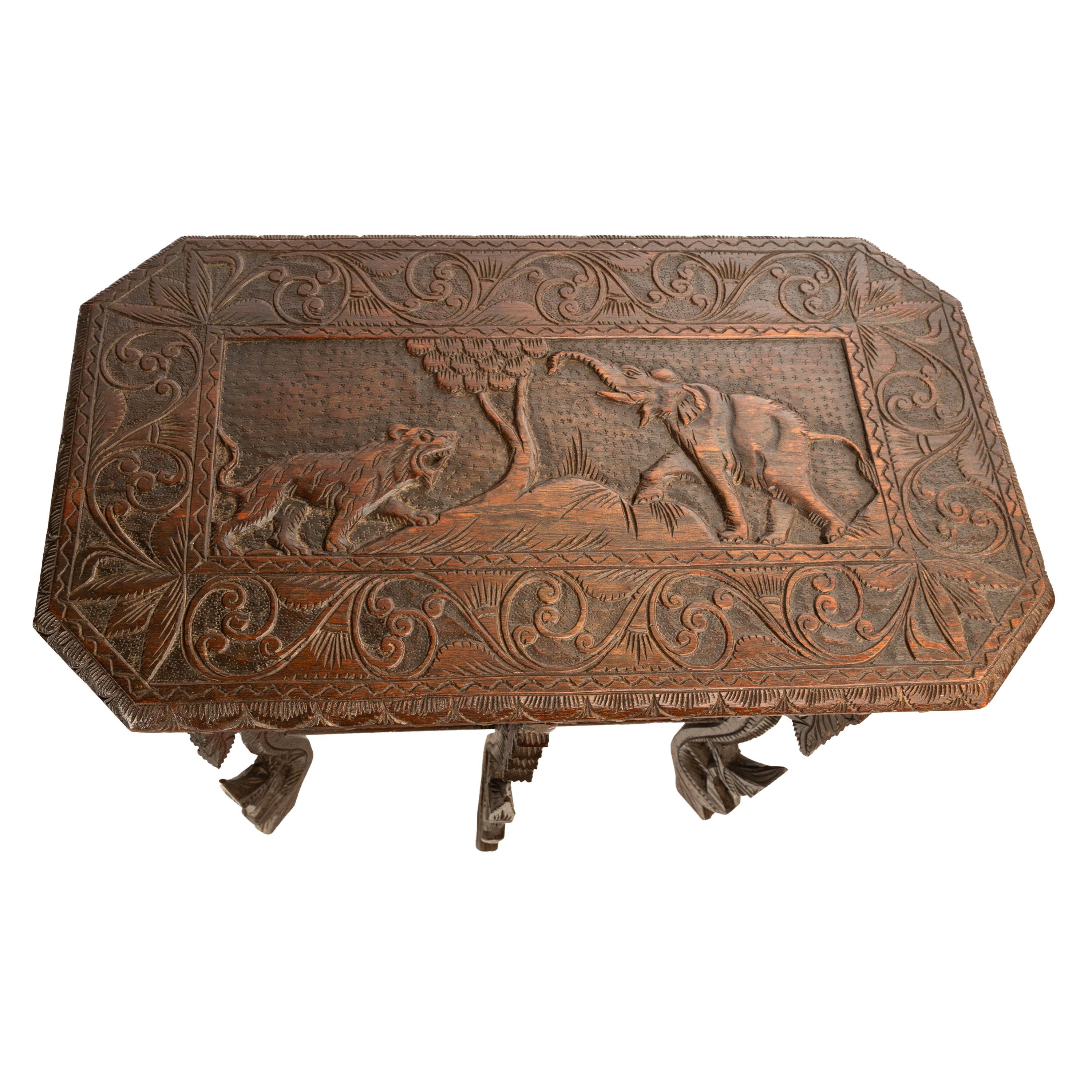 Antique Anglo Indian Carved Rosewood Six Legged Side Table Elephant Tiger 1900 In Good Condition For Sale In Portland, OR