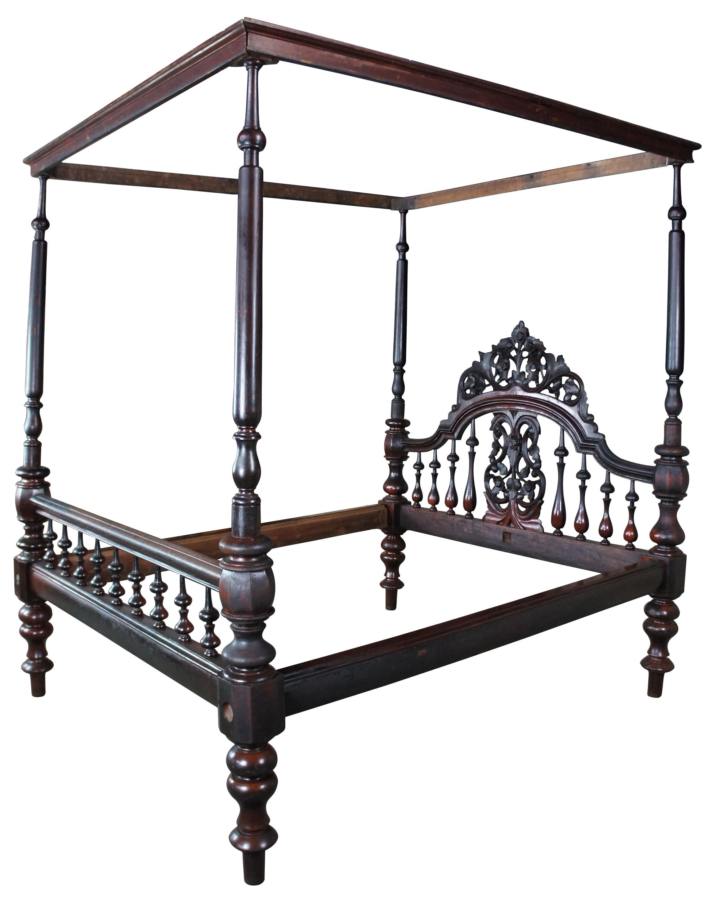 Monumental and Rare antique Anglo Indian Raj tester or canopy bed, circa first half 19th century. A genuine and Real McCoy Period example. Not to be confused with the many fakes and remakes. Made from solid mahogany with intricate carvings