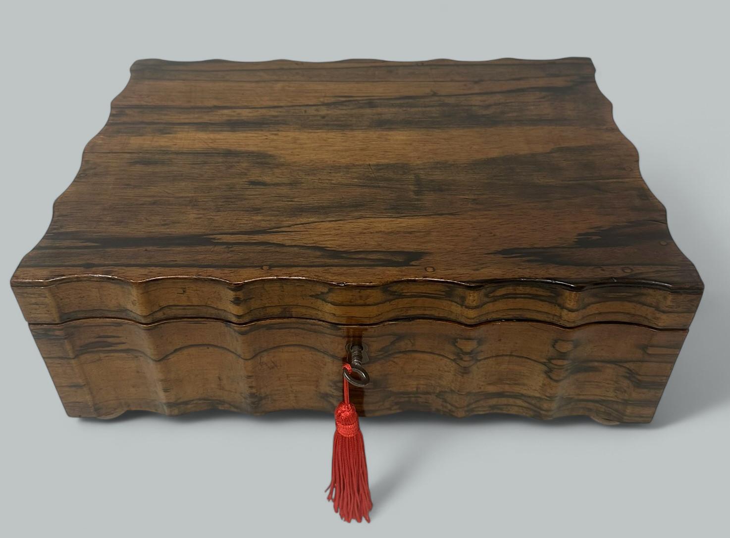 Stunning and Rare Example of a well grained Ladys or Gentlemans Coromandel Anglo Indian, possibly Ceylonese, fitted Travelling Sewing or Jewellery Casket of good size proportions. Third quarter of the Nineteenth Century. 

The rectangular hinged