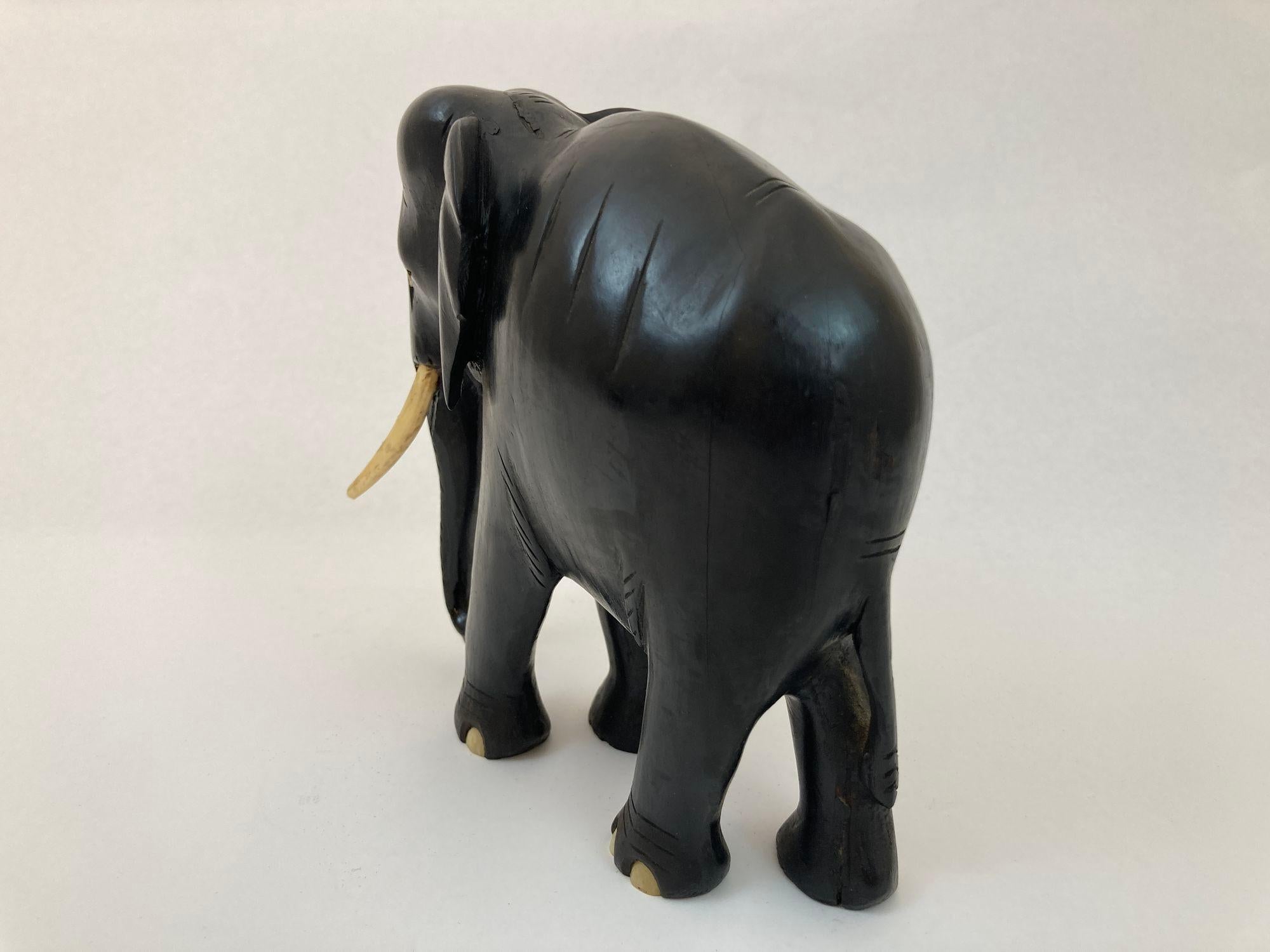 Anglo-Indian Antique Anglo Indian Elephant Black Ebonized Wood Hand Carved Sculpture For Sale