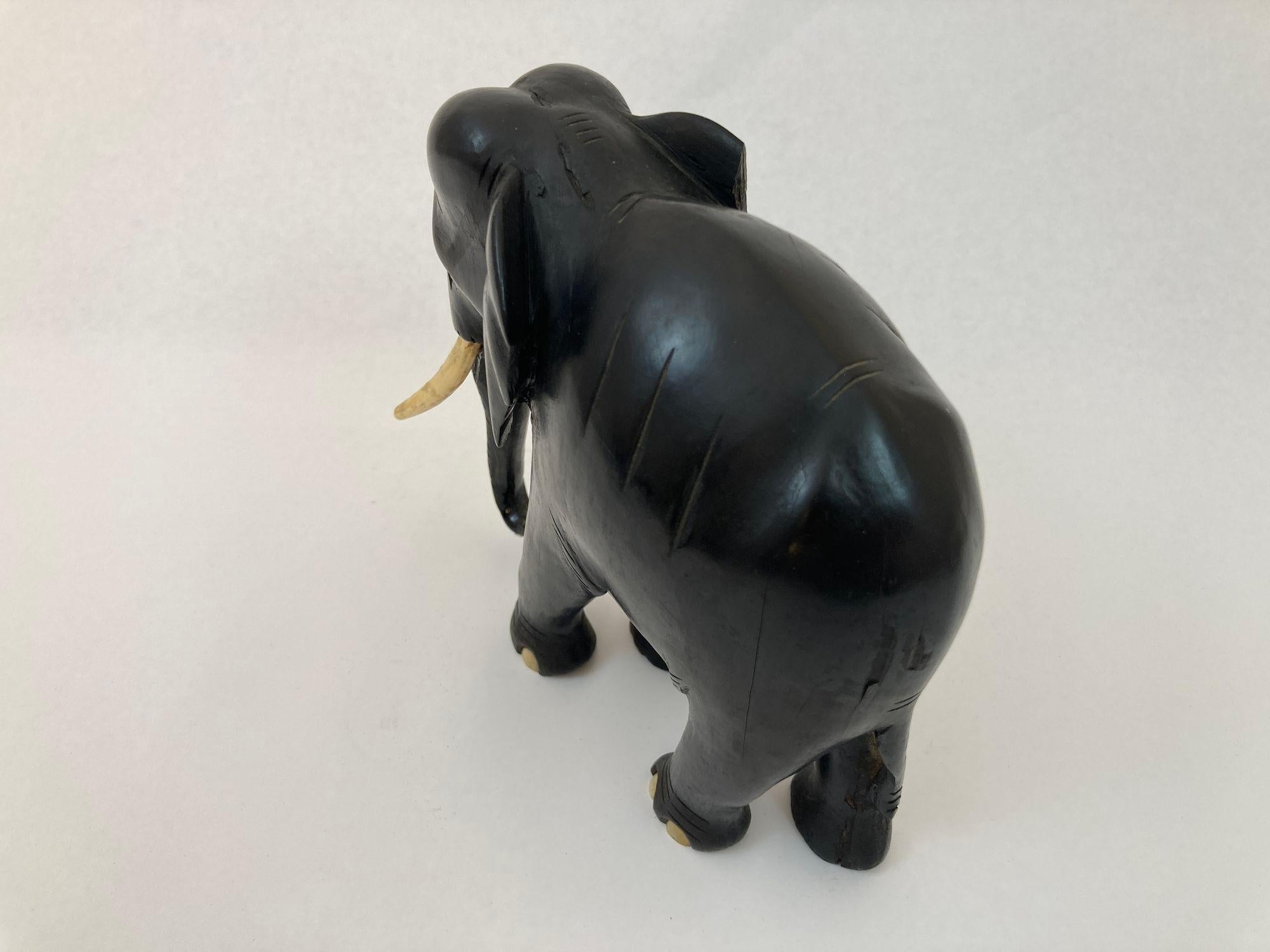 Sri Lankan Antique Anglo Indian Elephant Black Ebonized Wood Hand Carved Sculpture For Sale