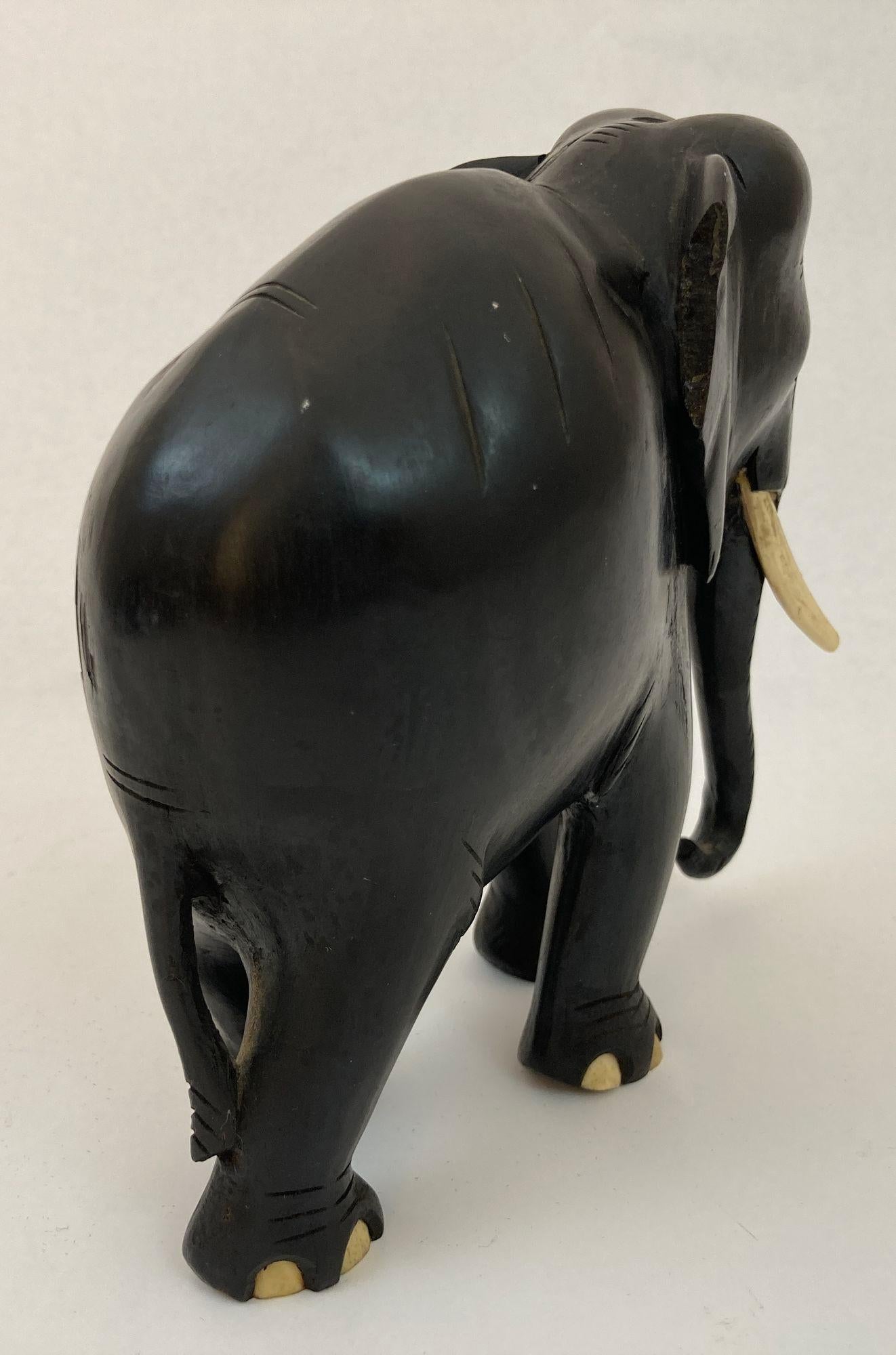 Hand-Carved Antique Anglo Indian Elephant Black Ebonized Wood Hand Carved Sculpture For Sale
