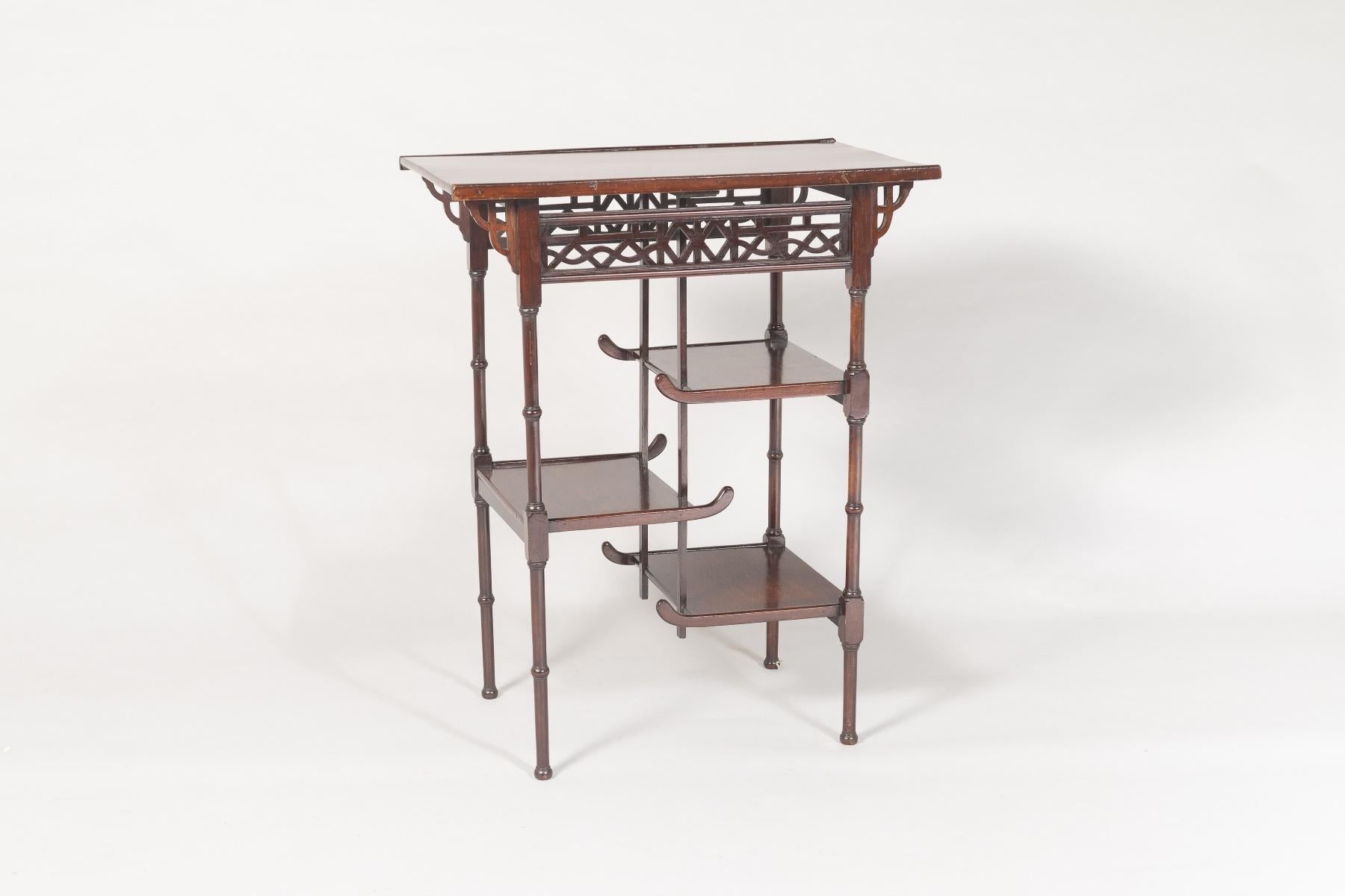 A beautiful Anglo-Japanese pagoda table in the manner of E W Godwin, no makers mark but a period piece in lovely condition.  Circa 1890 – 1910
A dainty piece with wonderful light detailing, fretwork frieze detail, three pagoda style shelves