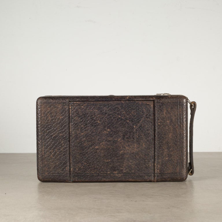 ABOUT  

An original antique folding camera with a leather wrapped body, sliding lens connected to the body by bellows and Mahogany base. It folds smoothly closed to 2.5 inches. This camera has retained its original finish and has the appropriate