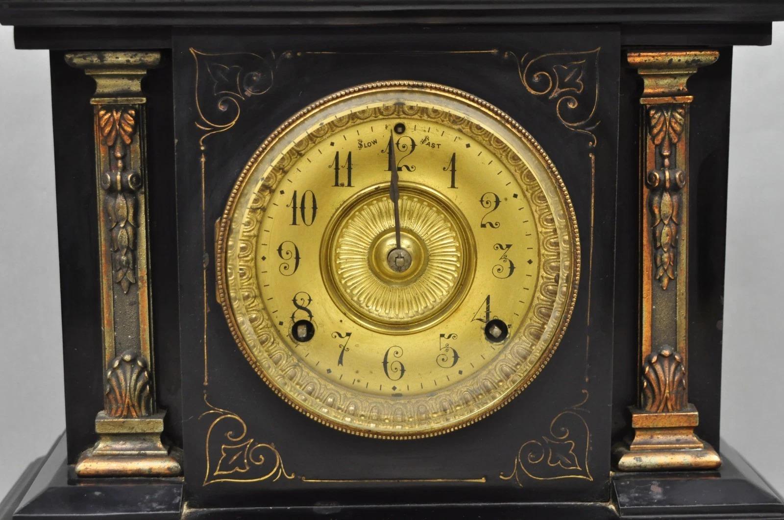 Empire Antique Ansonia Black Mantel Clock with Bronze Coated Columns and Claw Feet For Sale