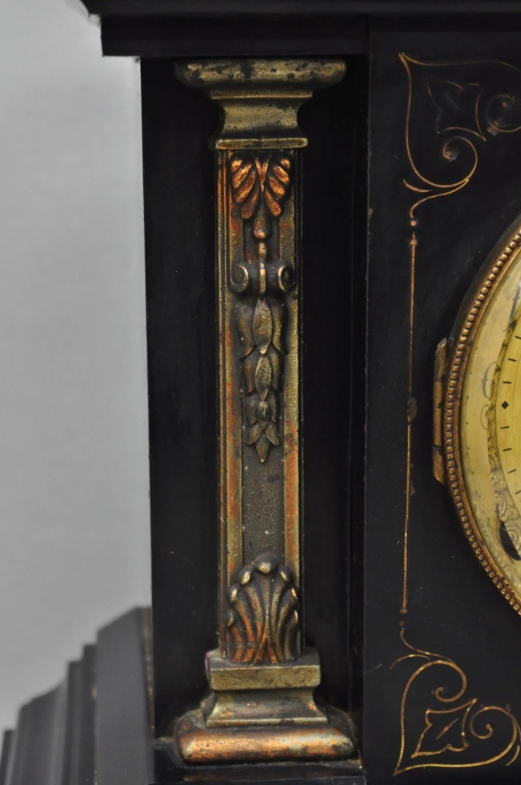 Antique Ansonia Black Mantel Clock with Bronze Coated Columns and Claw Feet In Good Condition For Sale In Philadelphia, PA