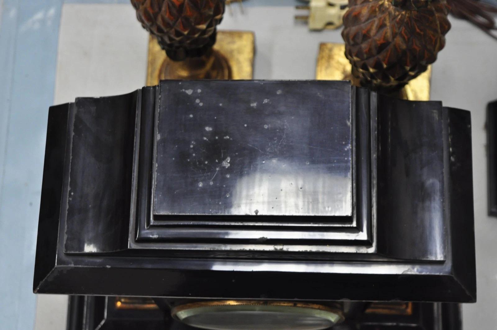 19th Century Antique Ansonia Black Mantel Clock with Bronze Coated Columns and Claw Feet For Sale