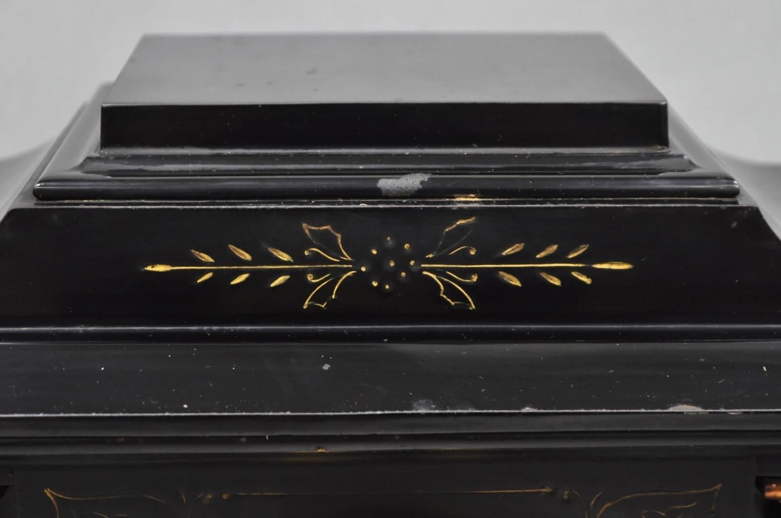 Metal Antique Ansonia Black Mantel Clock with Bronze Coated Columns and Claw Feet For Sale