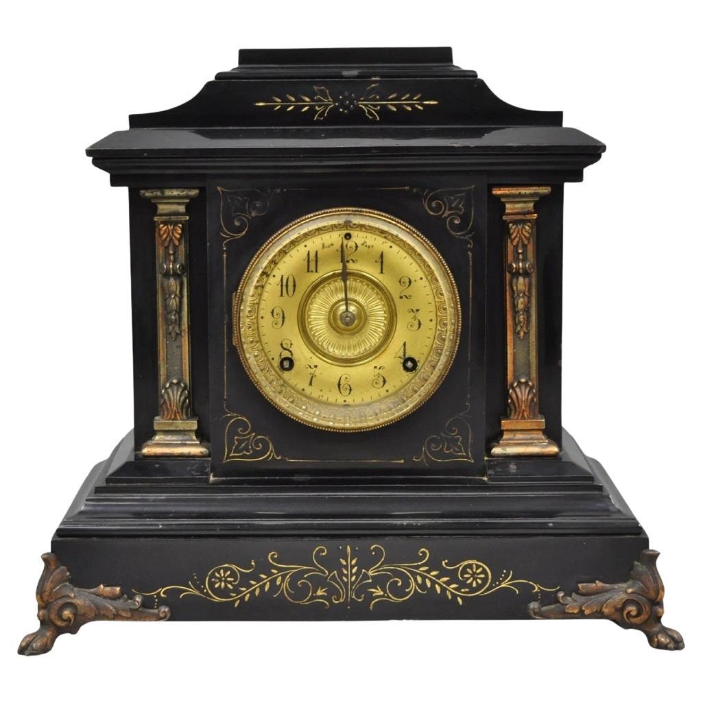 Antique Ansonia Black Mantel Clock with Bronze Coated Columns and Claw Feet