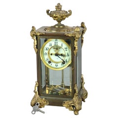 Antico orologio Ansonia in ottone, bronzo e cristallo C1890