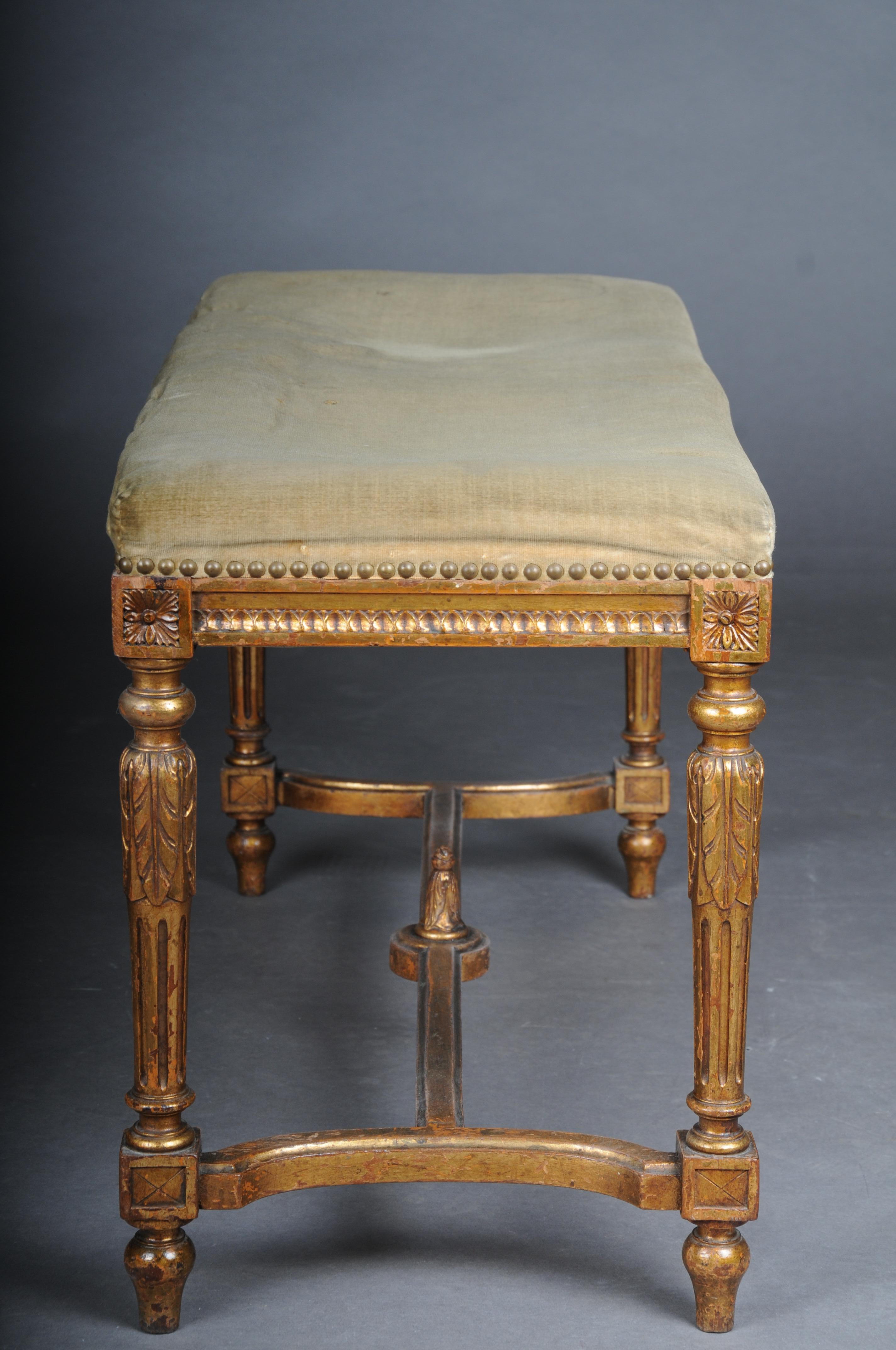 Old antique bench, Louis XVI, gold, beech, around 1880

Impressive and rare bench, France around 1880.
Louis XVI made of solid beech wood, hand-carved and gilded. 
good historical, age-appropriate condition.