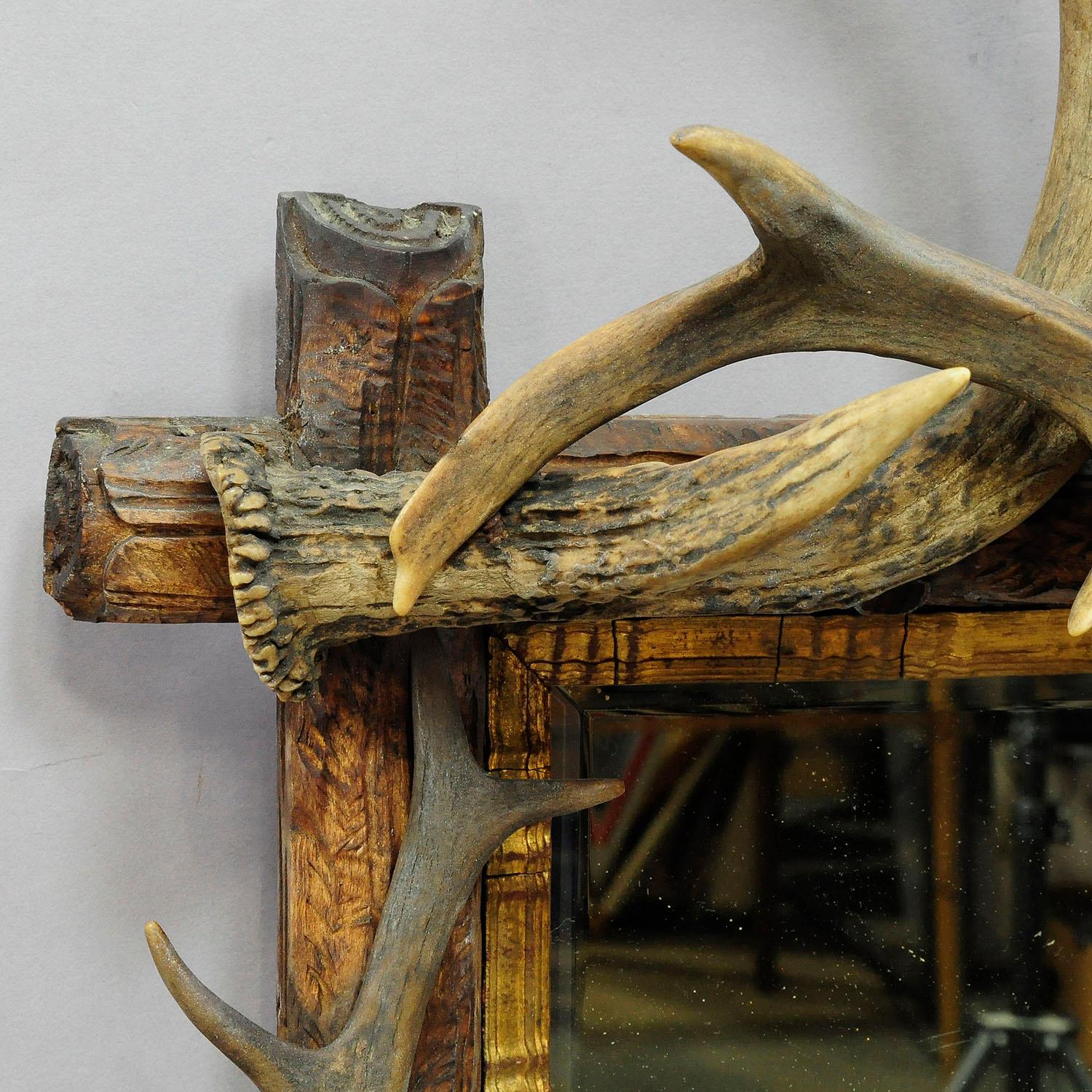 Black Forest Antique Antler Frame with Rustic Antler Decorations and Mirror