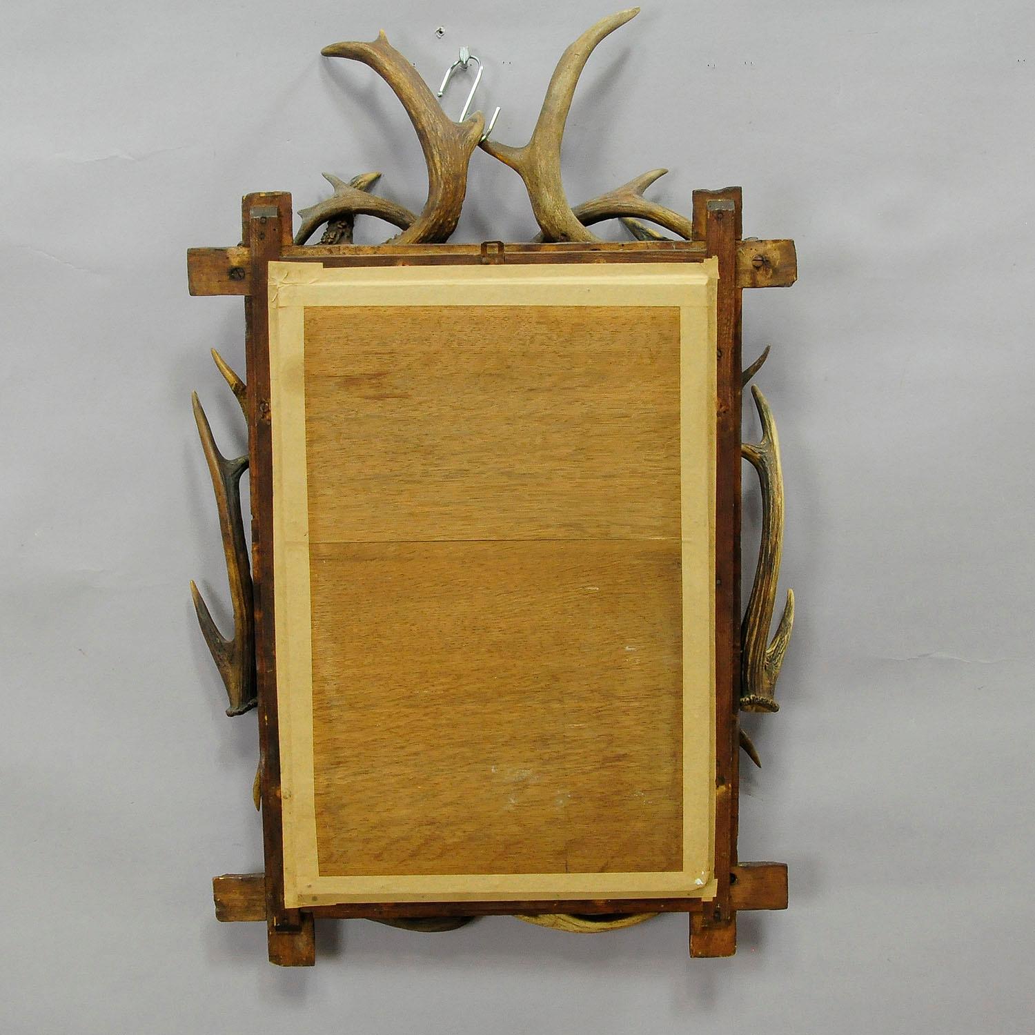 German Antique Antler Frame with Rustic Antler Decorations and Mirror