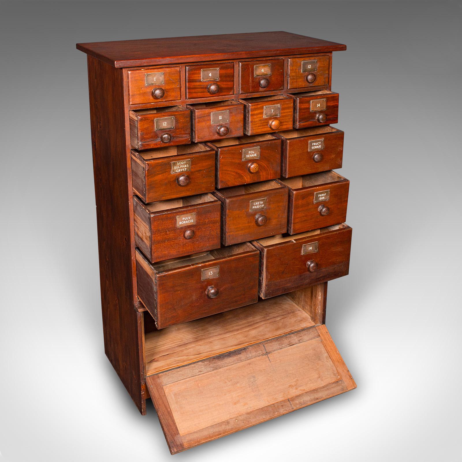 This is a rare and unusual antique Victorian apothecary chest, offering superb storage and period character, circa 1880. This 16-drawer chemist’s shop cabinet showcases fine craftsmanship, with original fascia labels and elegant mahogany