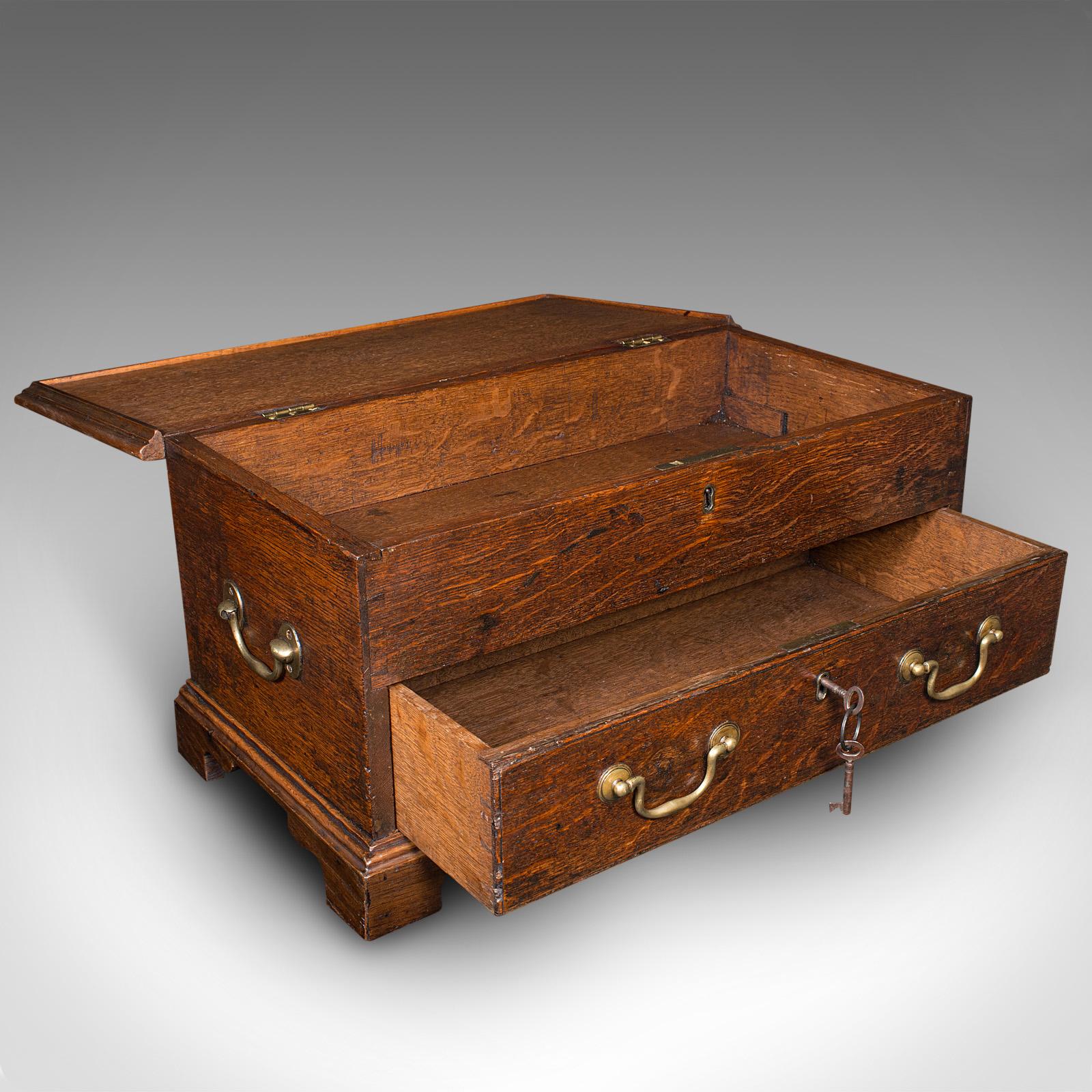 This is an antique apprentice mule chest. An English, oak miniature desktop coffer, dating to the late Georgian period, circa 1800.

Wonderful desk storage box, a great example of apprentice furniture
Displays a desirable aged patina and in good