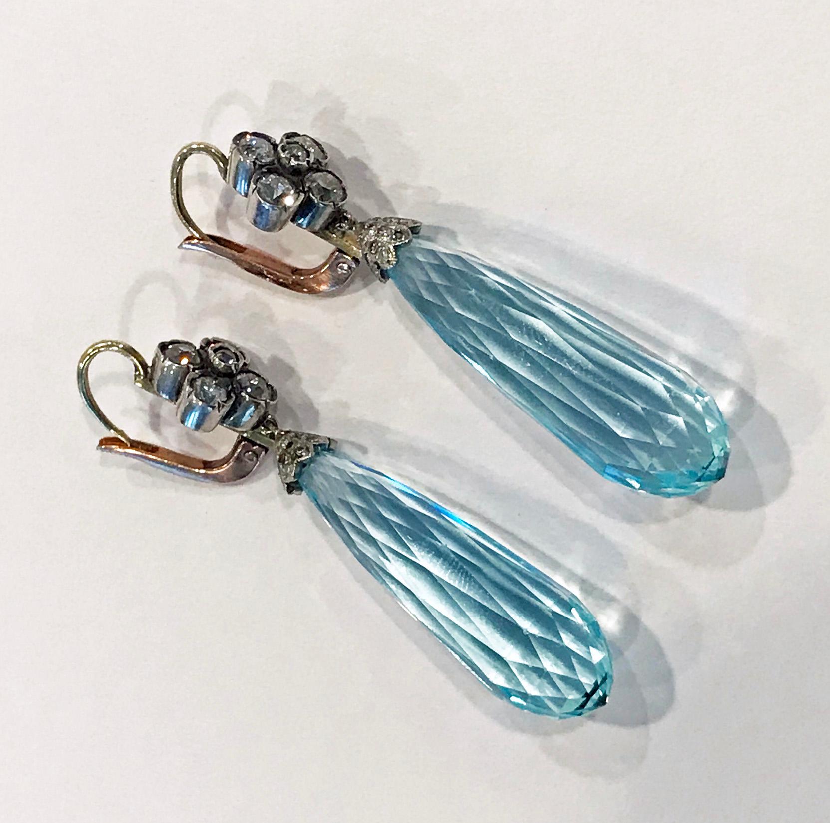 Pair of Antique Aquamarine and Diamond drop Earrings C.1900. 24 diamonds and have a surmount of five old cut diamonds, gold hook clip fitments to reverse. Drops measure: approximately 2 inches (excluding hooks) 