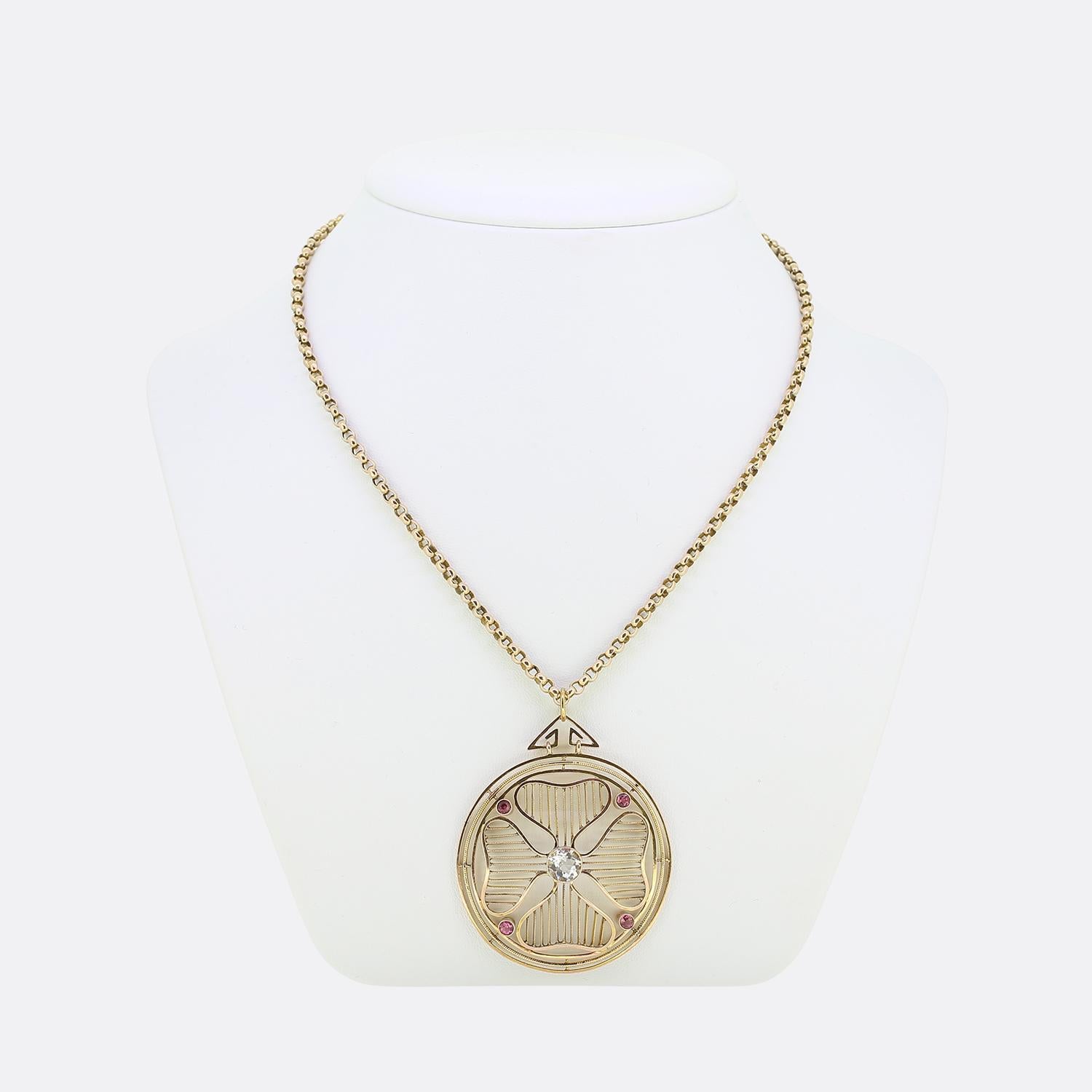 Here we have a wonderful antique pendant necklace. The pendant has been crafted from 9ct yellow gold into an circular shape and showcases a trio of borders around the outer edge consisting of both polished and roped finishes. Contained within is an