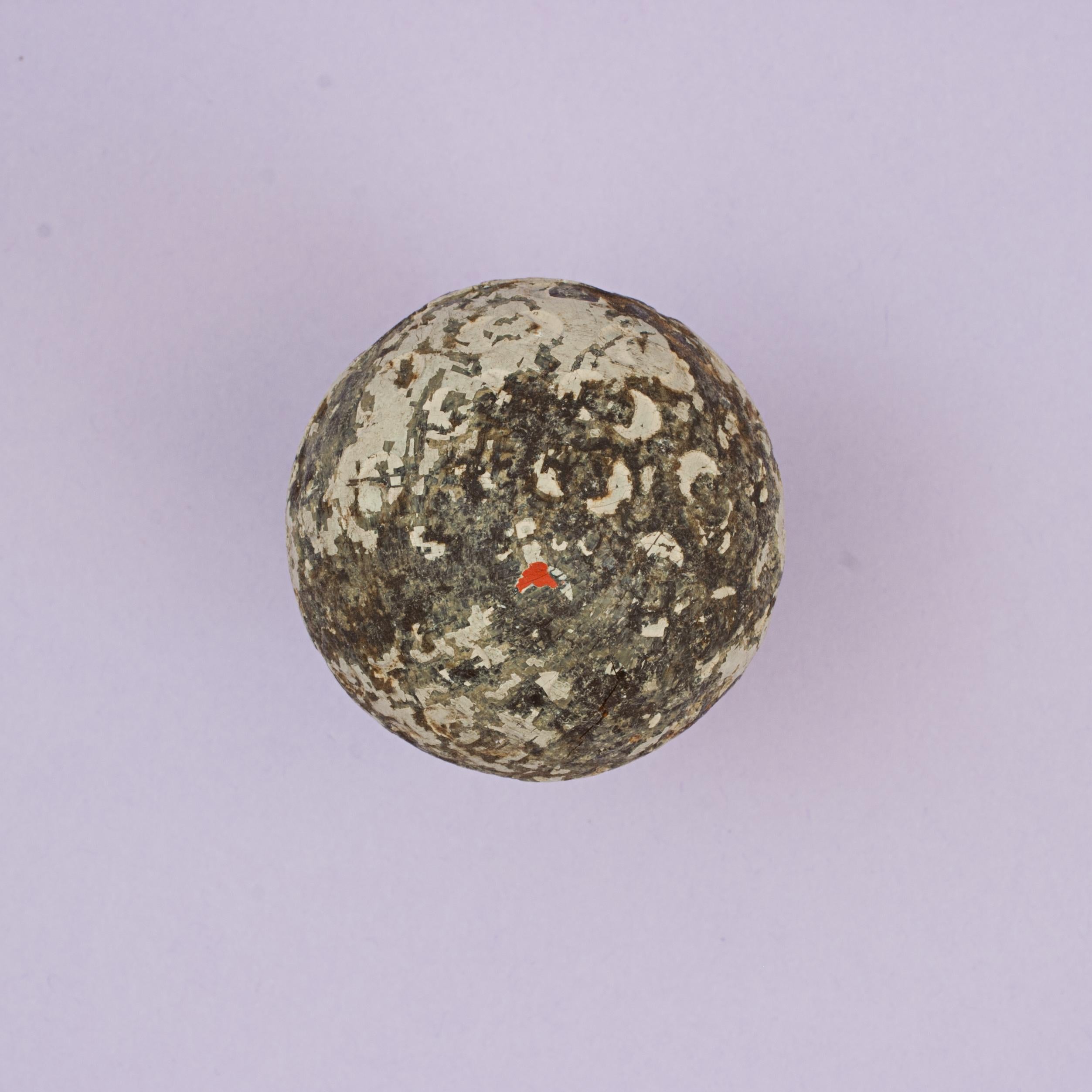 St. Mungo's 'Arch Colonel' Rubber Core Golf Ball.
An unusual patterned rubber core golf ball in reasonable condition manufactured by St. Mungo Manufacturing Co. of America, Newark, New Jersey and Glasgow. The ball is named 'Arch Colonel' on both