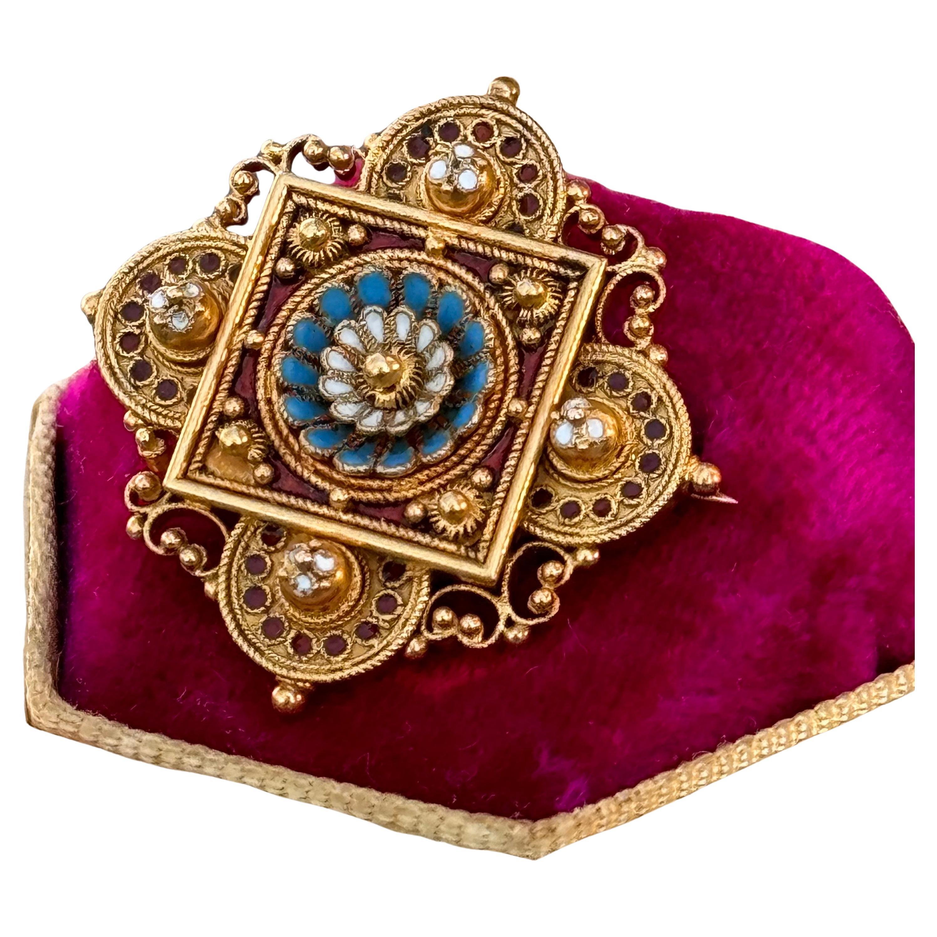 Antique Archaeological  Victorian Etruscan revival pin /brooch with beautiful details . Pin front features exceptional  quality of the granulation and filigree wirework with enamel work in between (enamel is in red ,turquoise blue and red color)