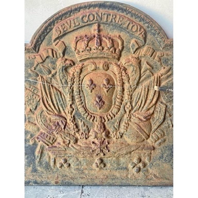 Antique arched fireback.

Item #: FA-0059

Additional information:
Dimensions: Approximate - 21