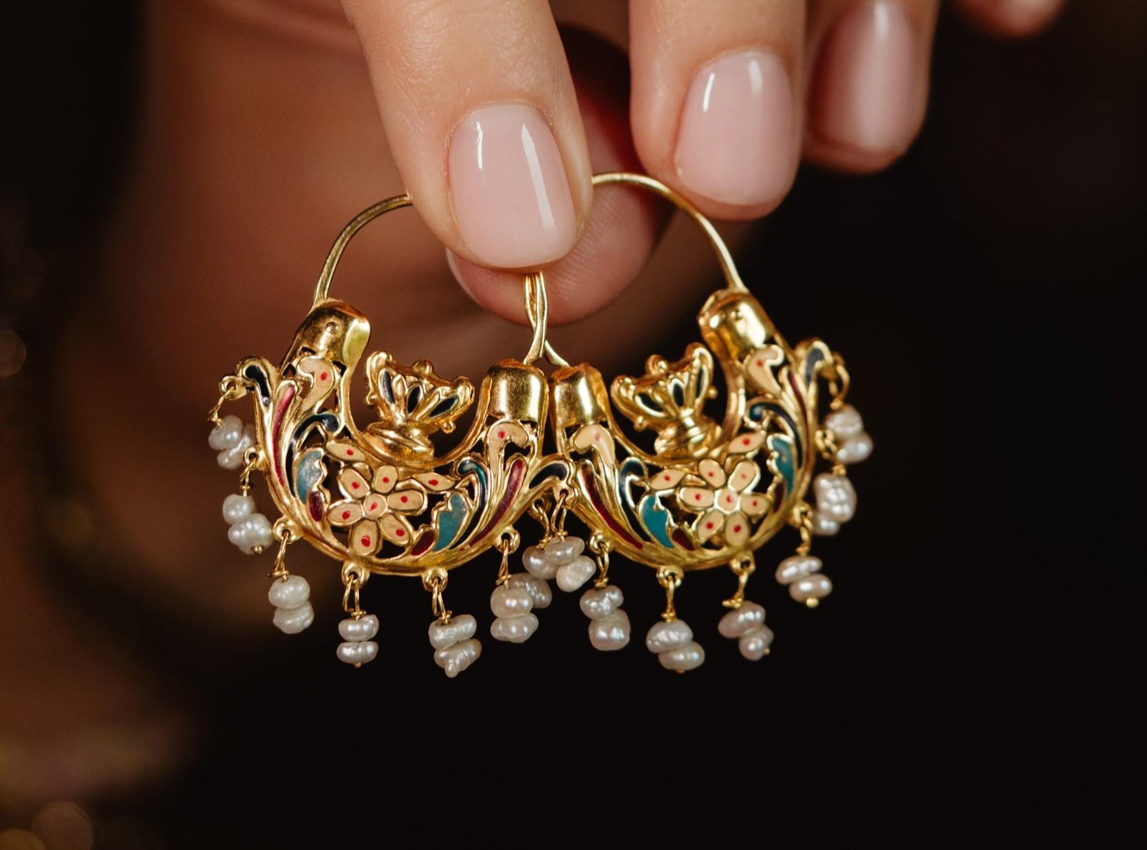 A museum-worthy 19th century pair of solid 18k gold earrings! Coming from the South of Italy, these archeological revival style earrings are adorned with the colorful enamel.

An extremely fine pair will turn the heads! Accented with baroque pearls