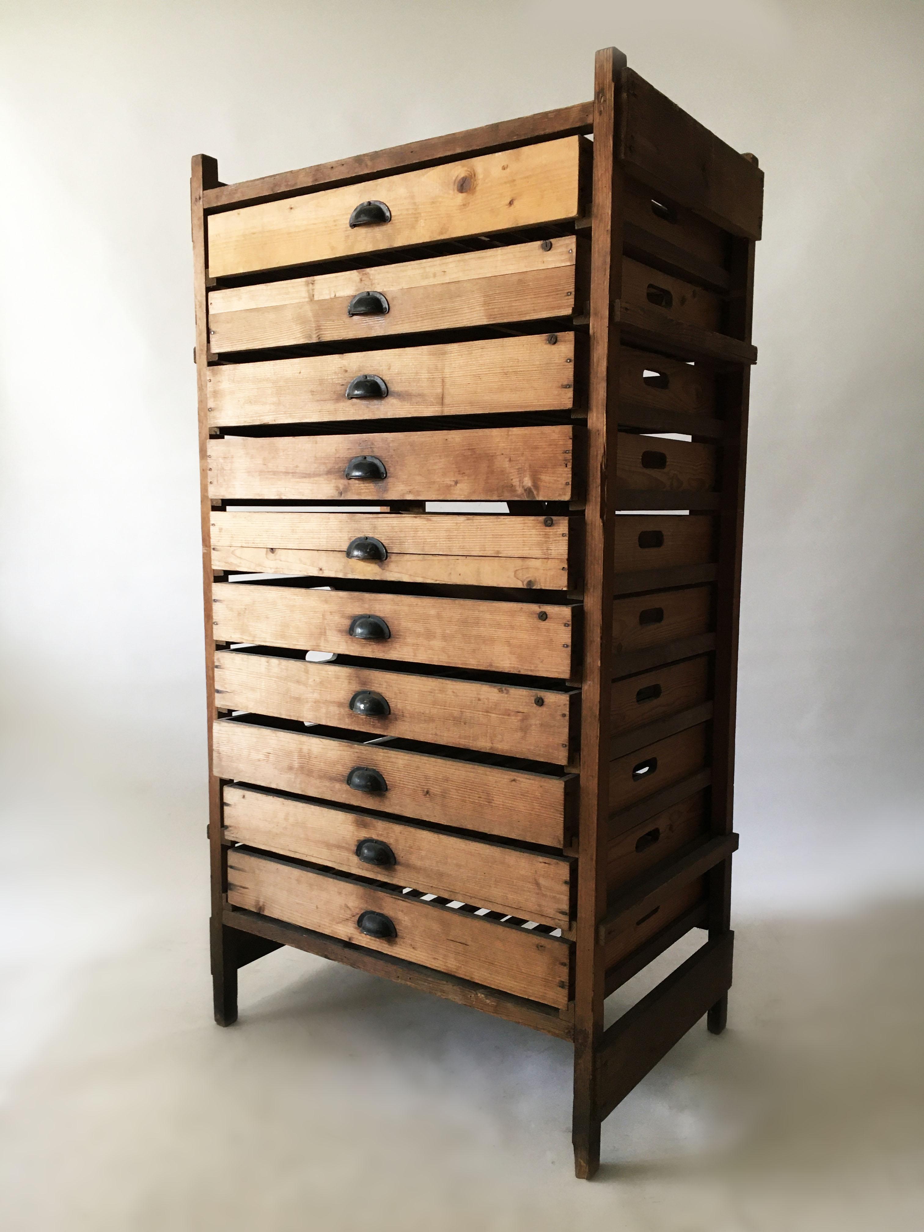 Primitive Modern Architectural Fruit Drying Cabinet, France 1920s. A beautiful antique architectural fruit drying cabinet made of wood and black metal pulls, circa 1920s from France.