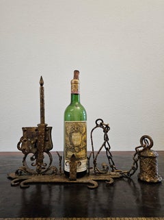 Scultura architettonica antica in ferro battuto e dorato