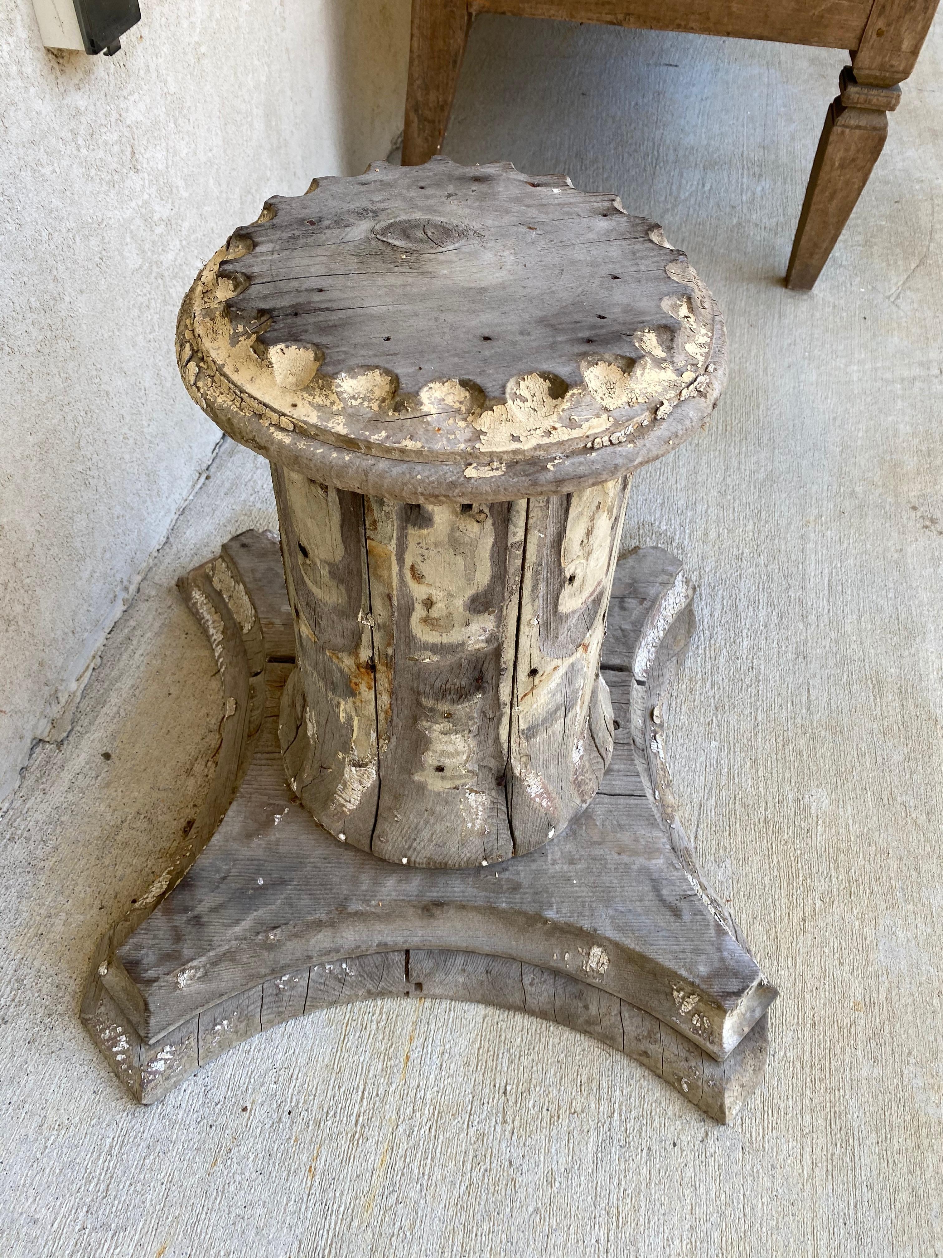 The very rustic antique wooden column plinth, pedestal or base in the classical style can be used as side table, end table or pedestal for either indoor or outdoor use -- casual, Classic, Swedish or Gustavian Style decor. White paint has been mostly