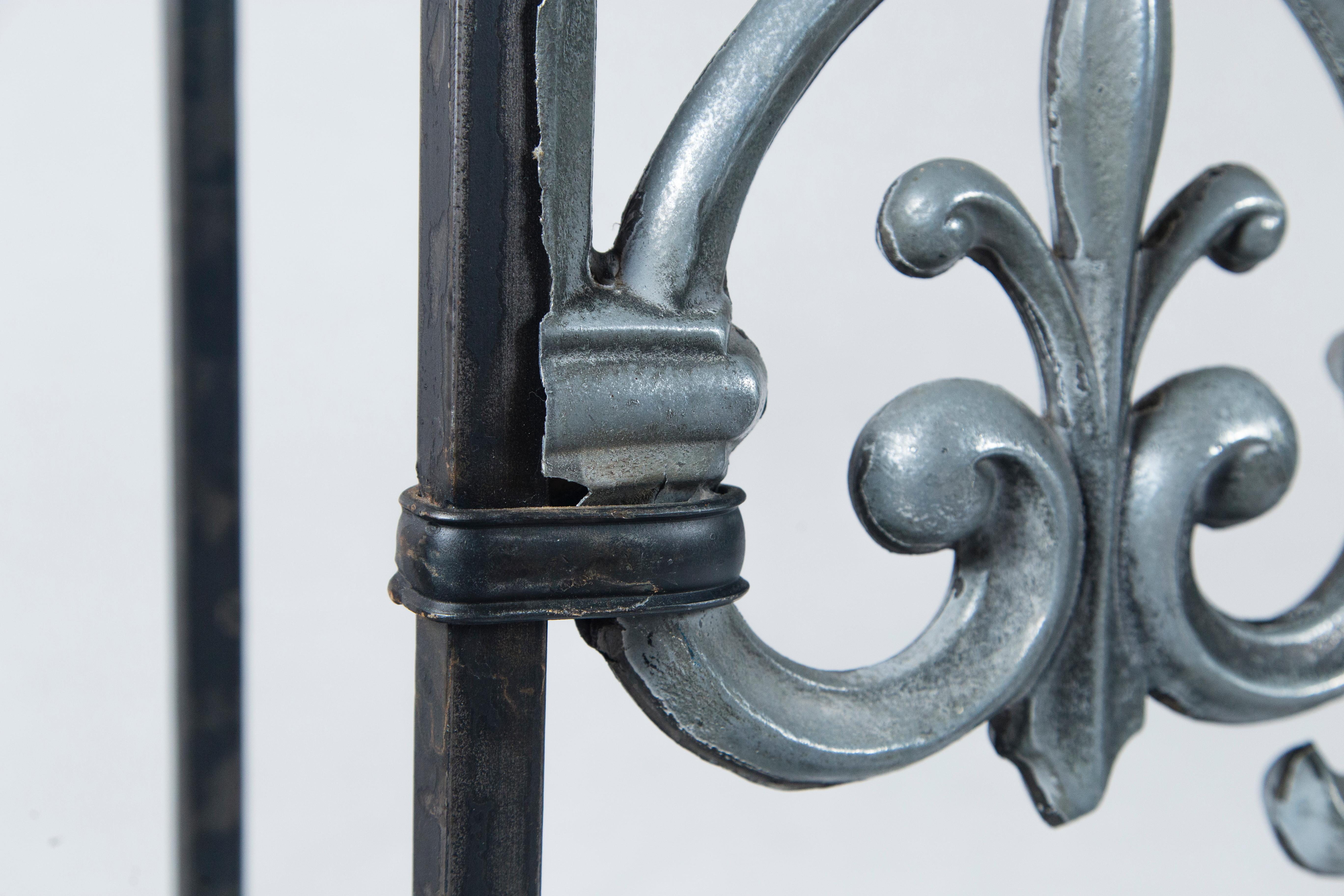 Antique Architectural zinc and iron custom console table, France. Table was designed around an antique zinc architectural ornament from the 19th century. Inset glass top and bottom shelf.