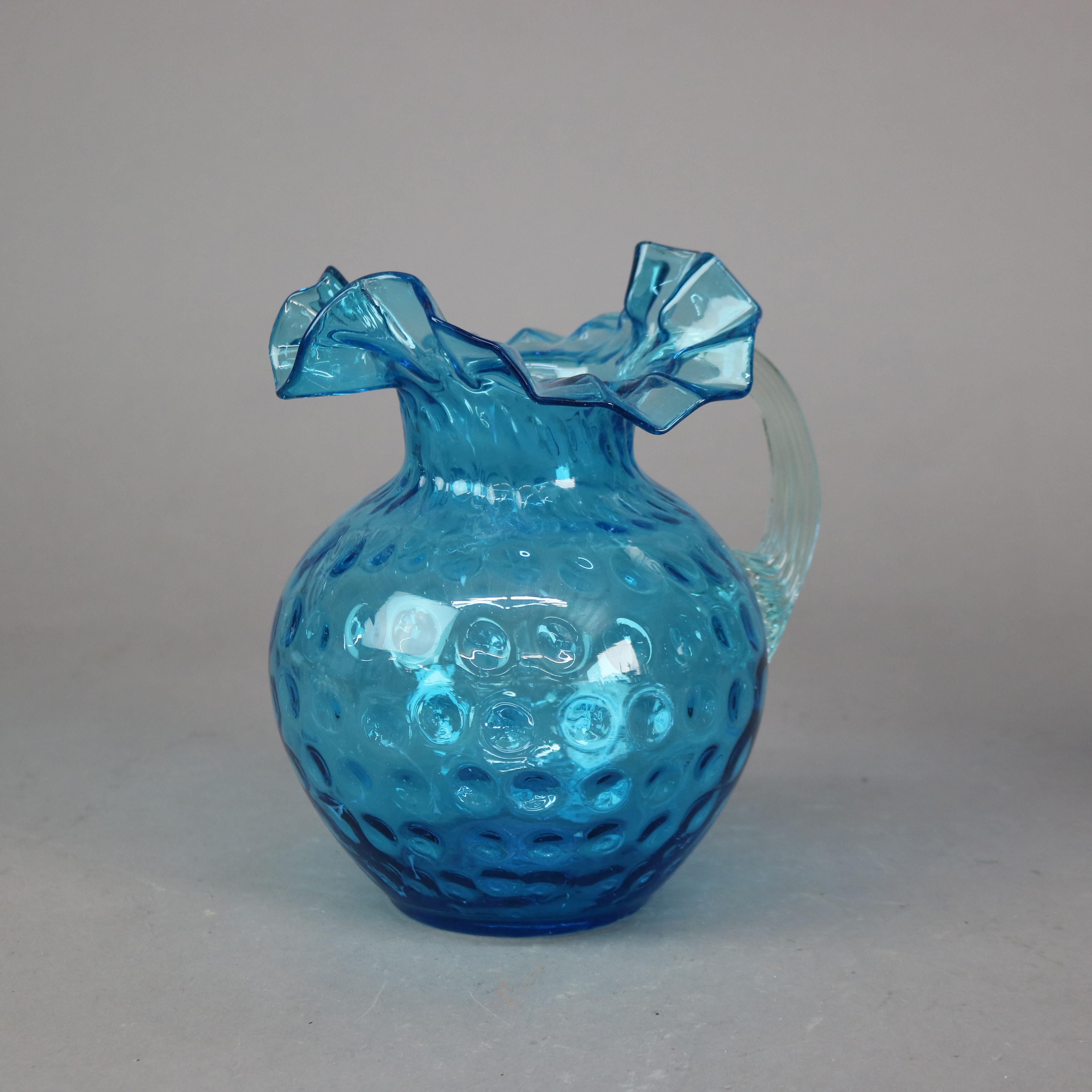 Antigua jarra de agua de cristal con asa de junco azul Ariel Coinspot C1900

Medidas - 9 1/4