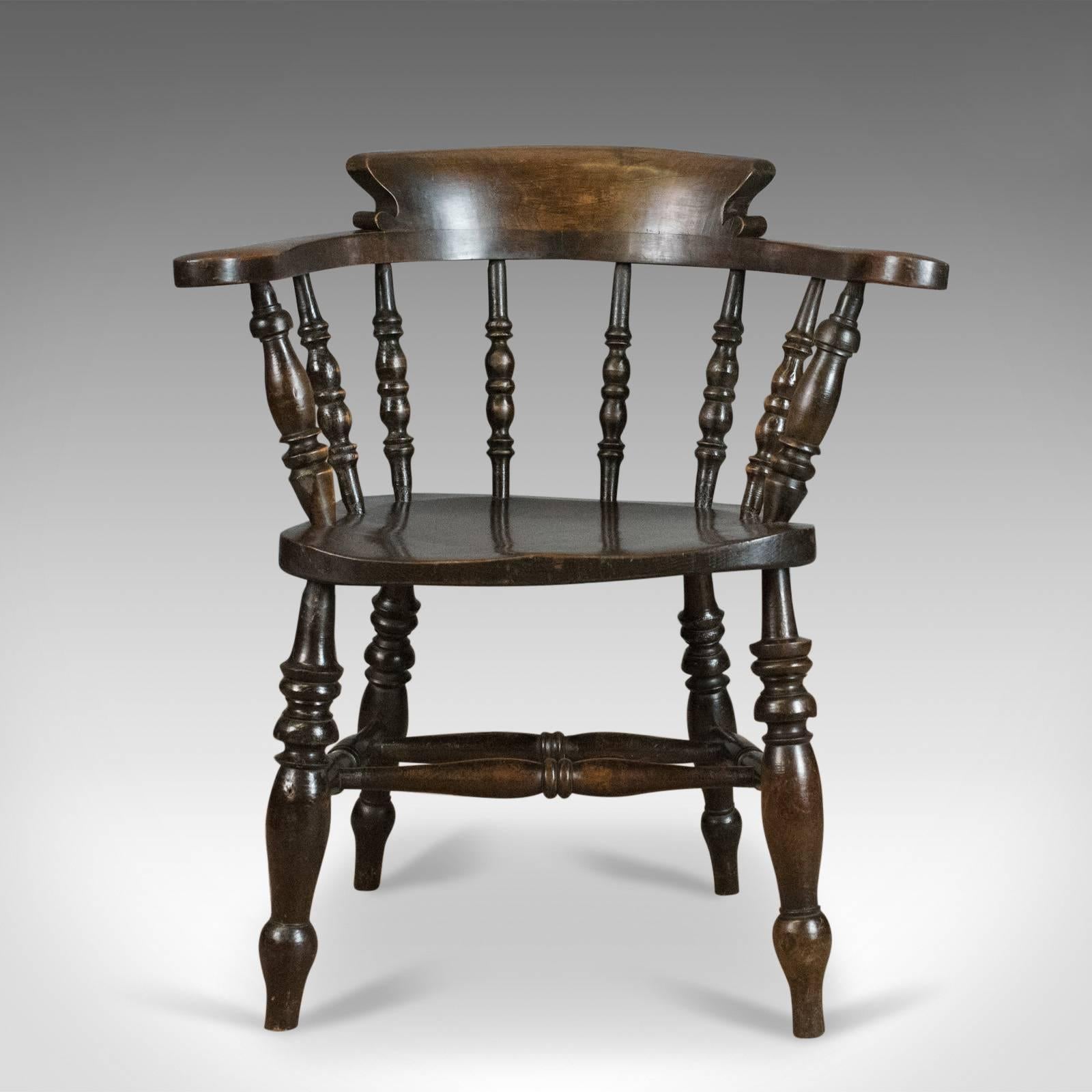 This is an antique armchair, an English, Victorian, elm, bow-back 'smokers', or 'captains', chair dating to circa 1900.

An appealing country kitchen, bow back armchair
Grain interest to the elm and beech in a wax polished finish
Solid and