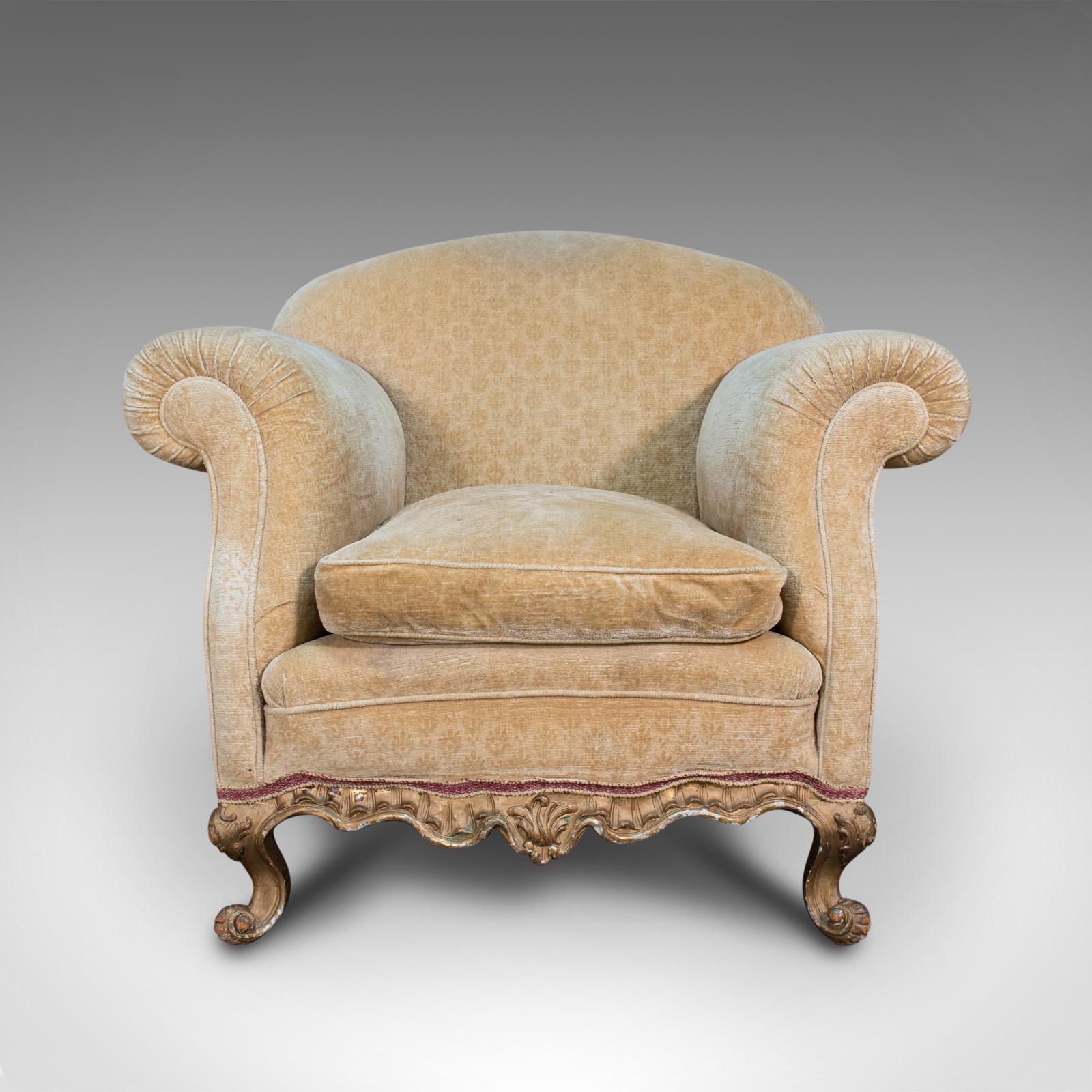This is an antique armchair. A French, upholstered beech lounge or tub seat, dating to the late Victorian period, circa 1900.

Lasting French elegance for the relaxed living room
Displays a desirable aged patina - can be enjoyed as is or