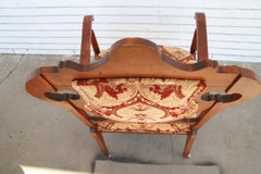 Antique Armchair with upholstery on casters