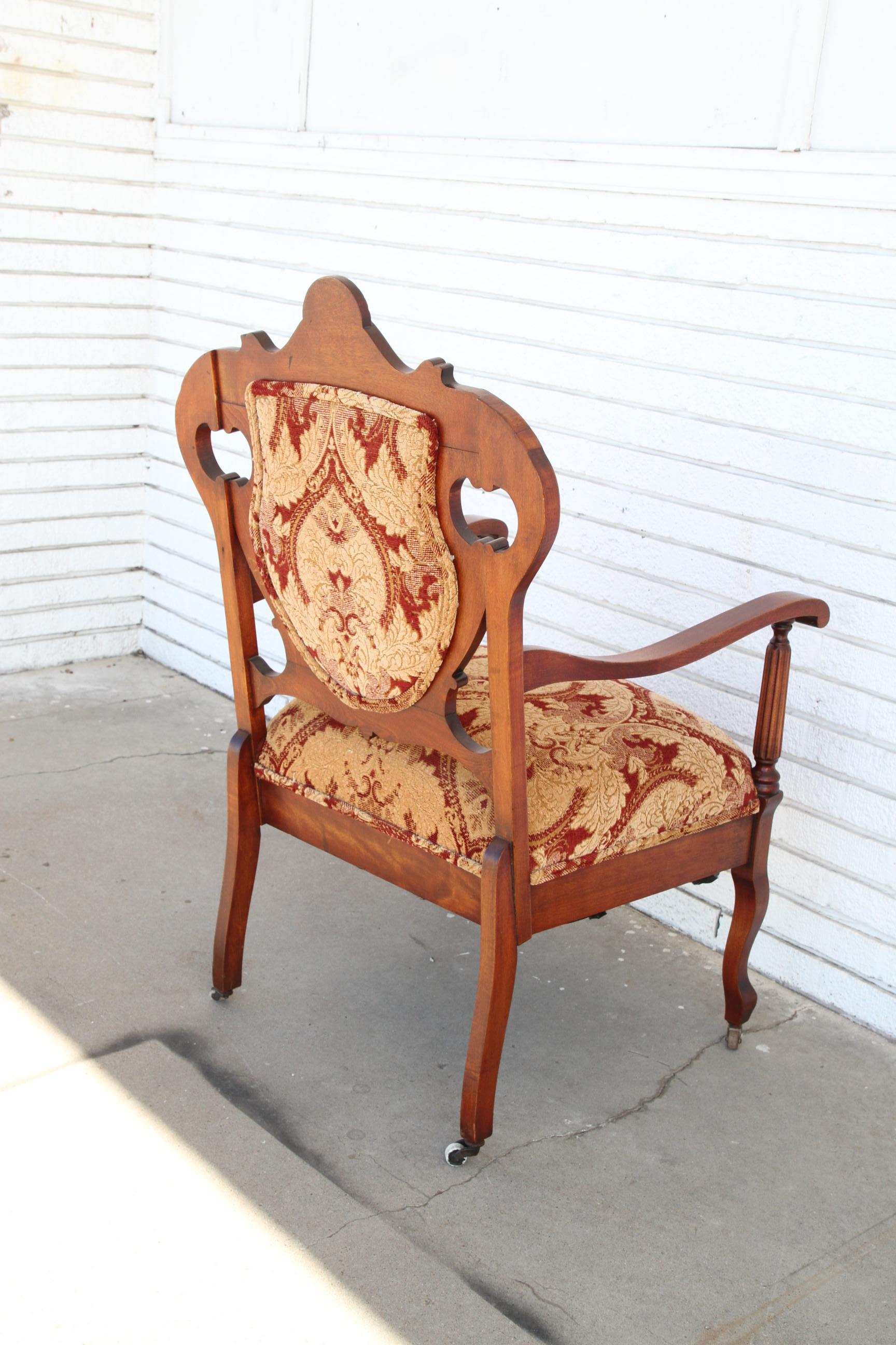 American Antique Armchair with upholstery on casters For Sale