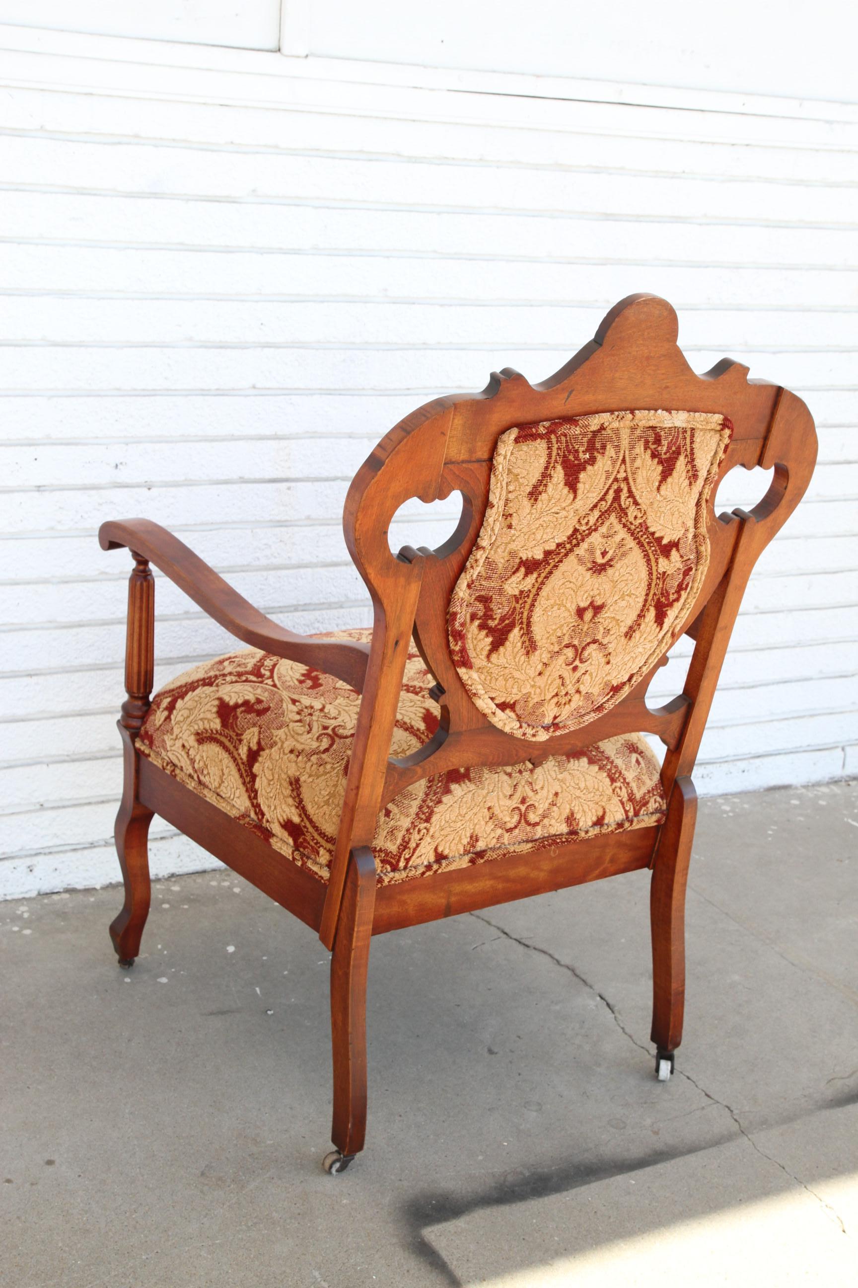 Antique Armchair with upholstery on casters In Good Condition For Sale In Pasadena, TX