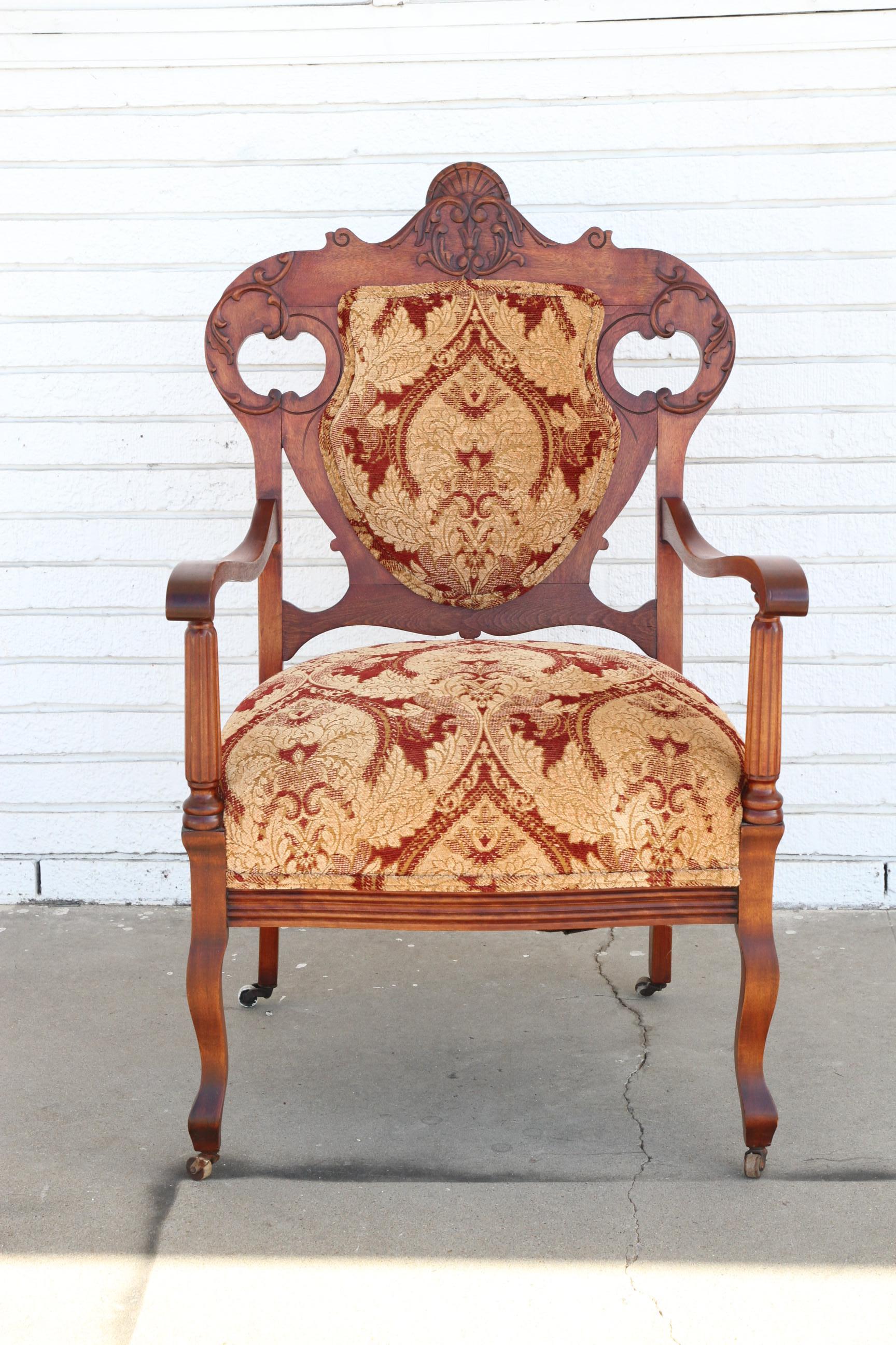 Fabric Antique Armchair with upholstery on casters For Sale